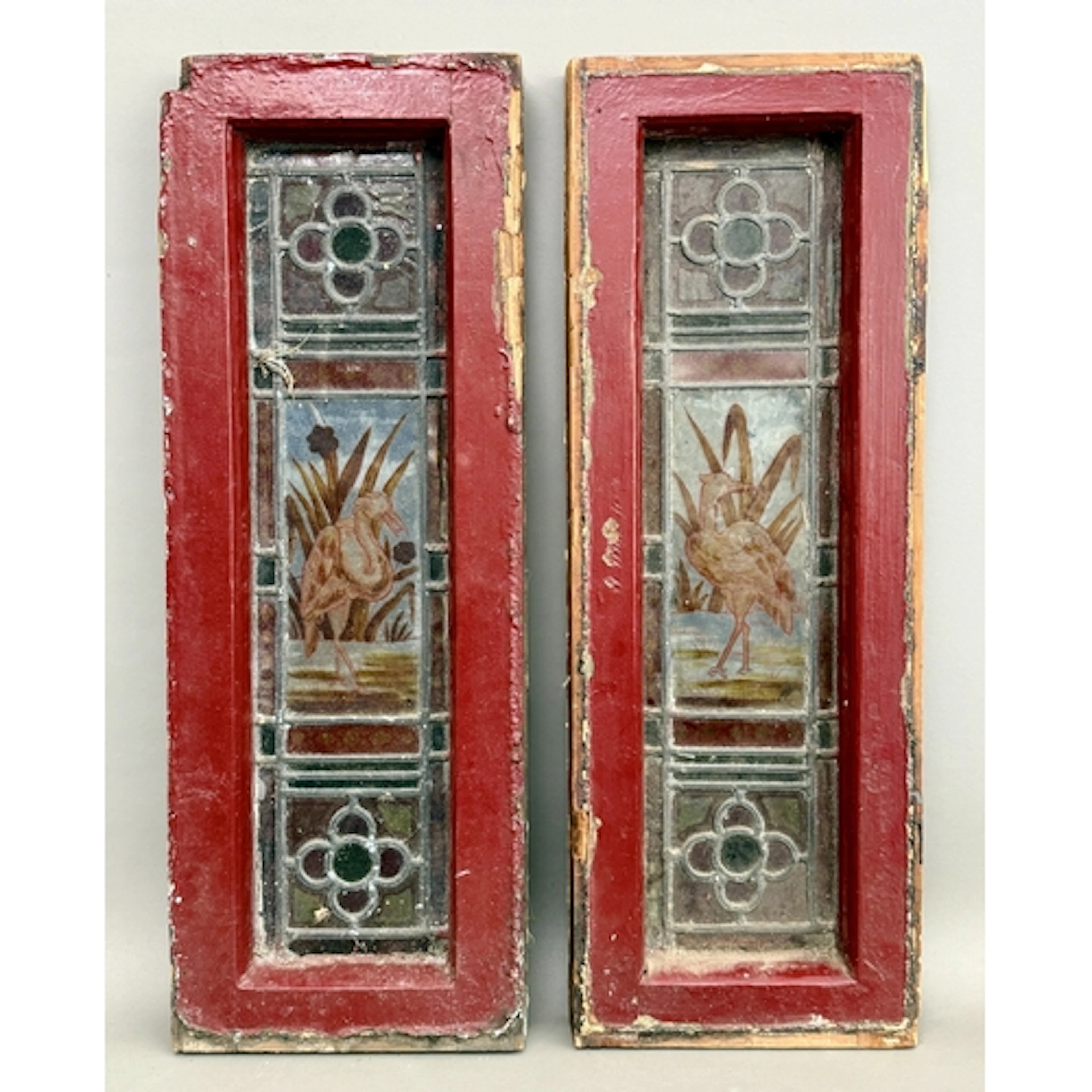 A pair of nineteenth century stained glass windows - with ce...