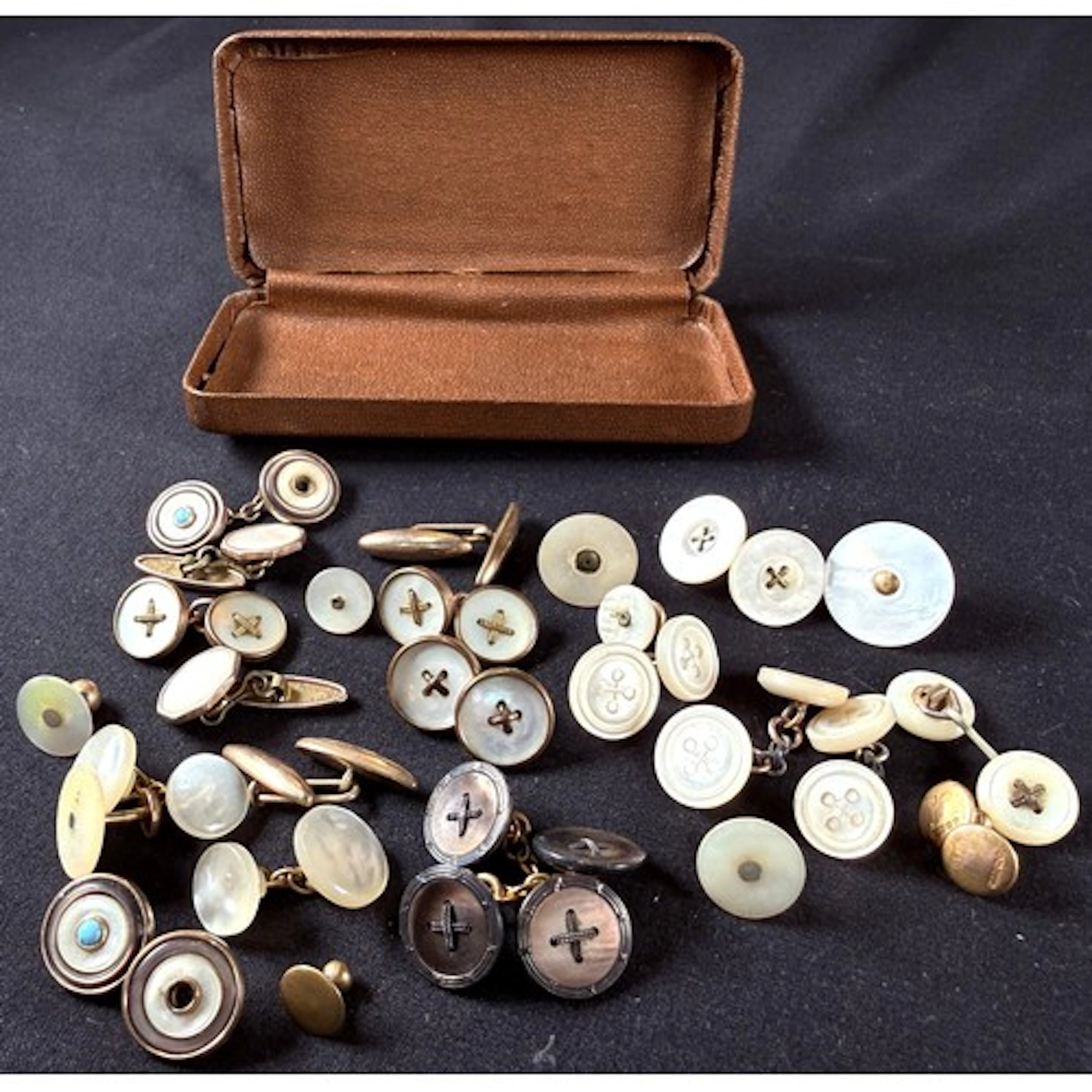 A box of mother of pearl and other cufflinks and studs, one ...