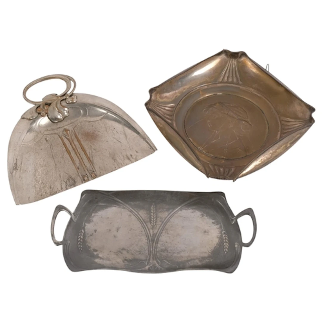 Three pieces of Art Nouveau silver plated ware, including cr...