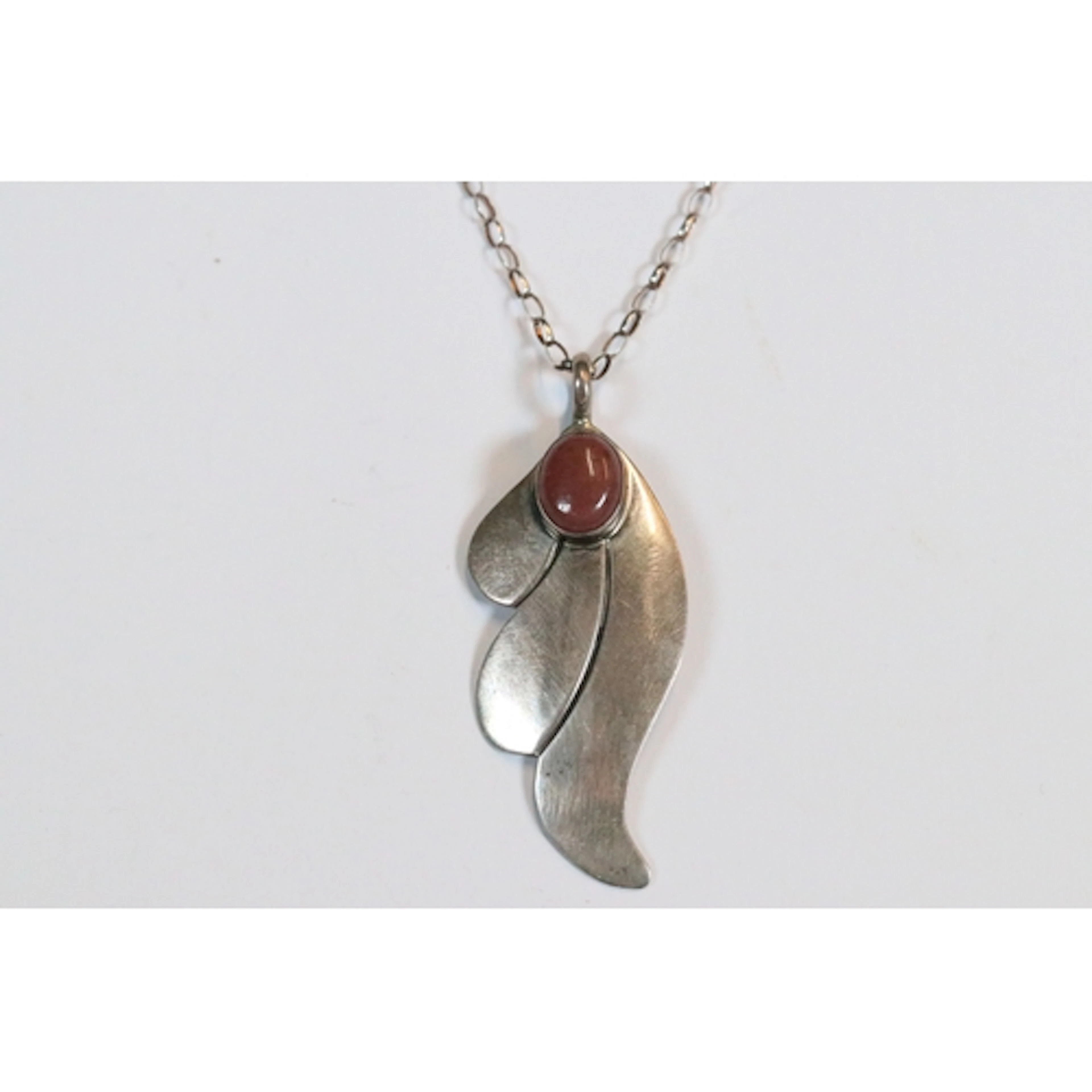 A contemporary sterling silver necklace and pendant, a penda...