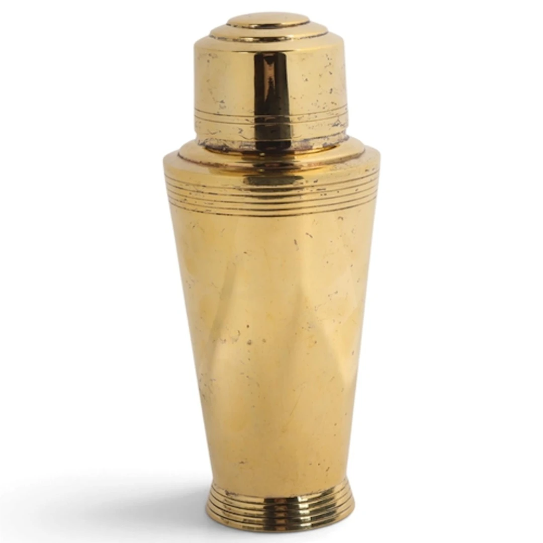 An Art Deco gilded 1 1/2 pint cocktail shaker, attributed to...