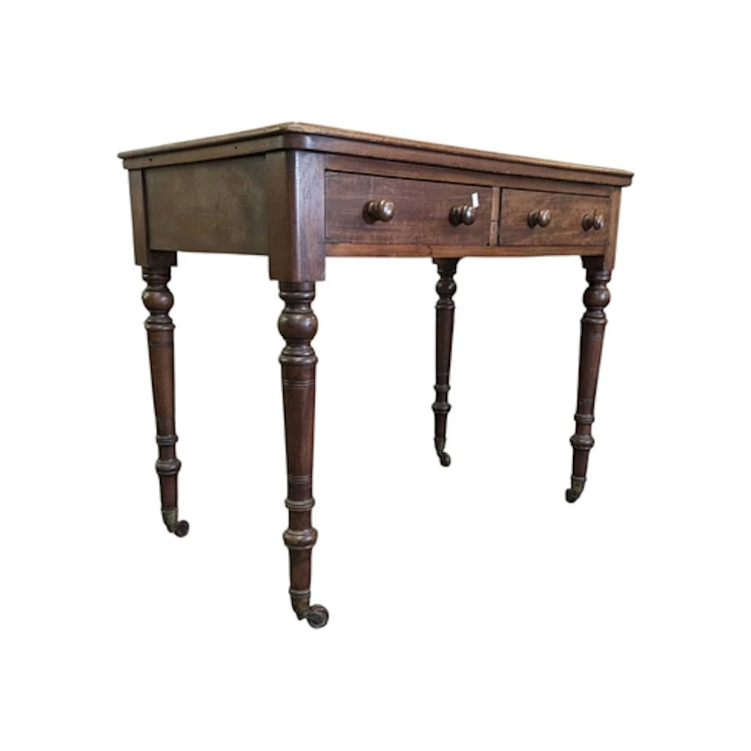 A 19th century Victorian mahogany writing desk table. The de...