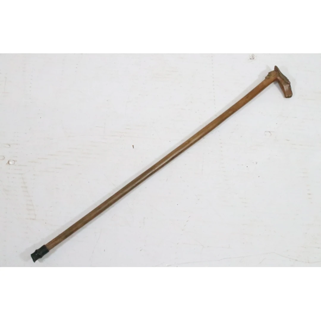 Early 20th century carved olive wood walking stick, probably...