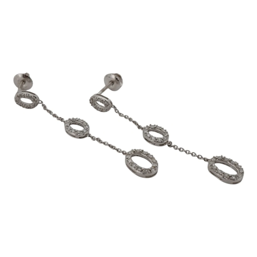 A pair of diamond pendent earrings, designed as oval hoop mo...