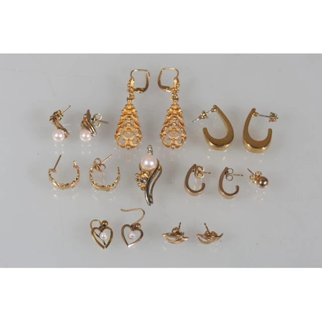 Gold tone earrings.