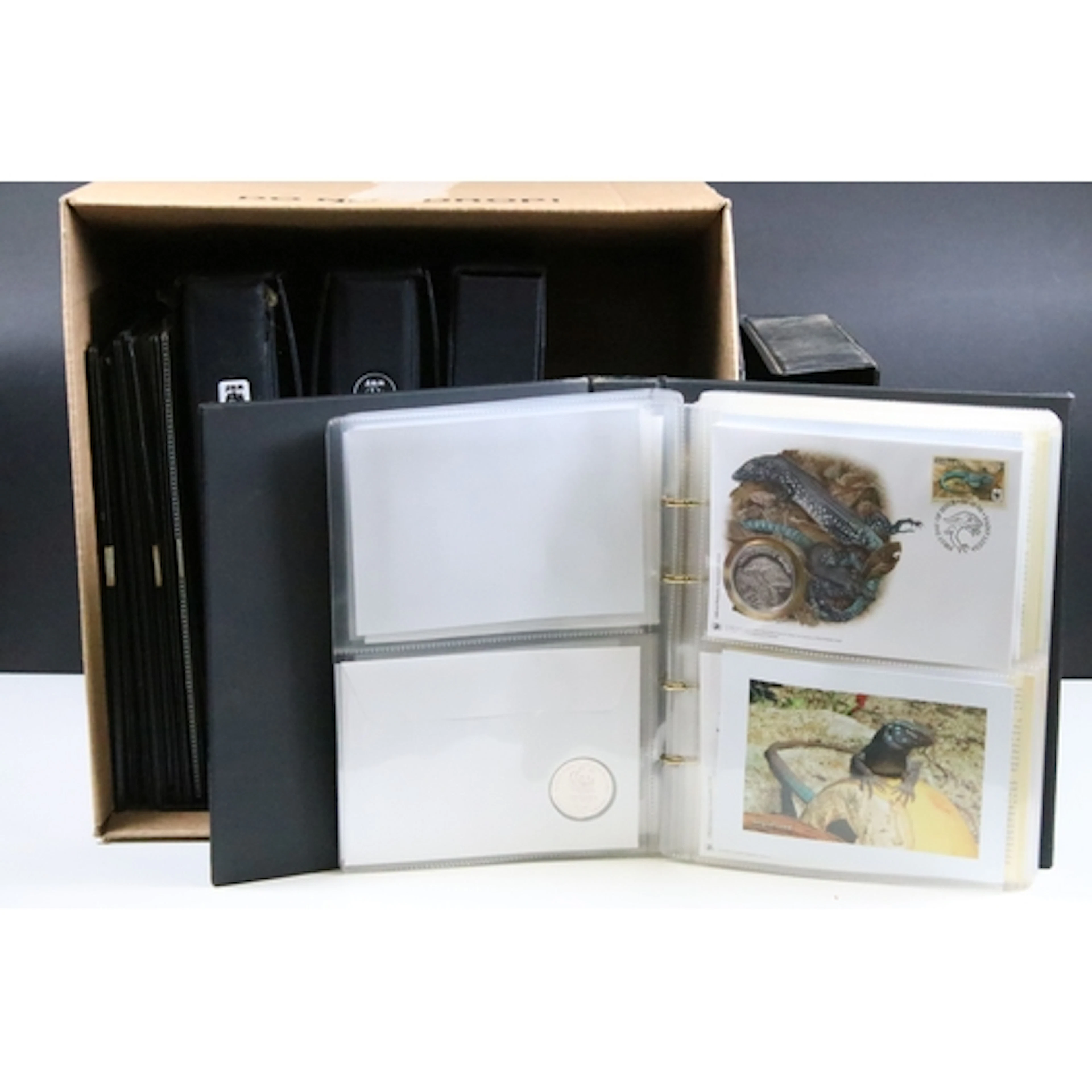 A large collection of World Wildlife Fund coin covers contai...