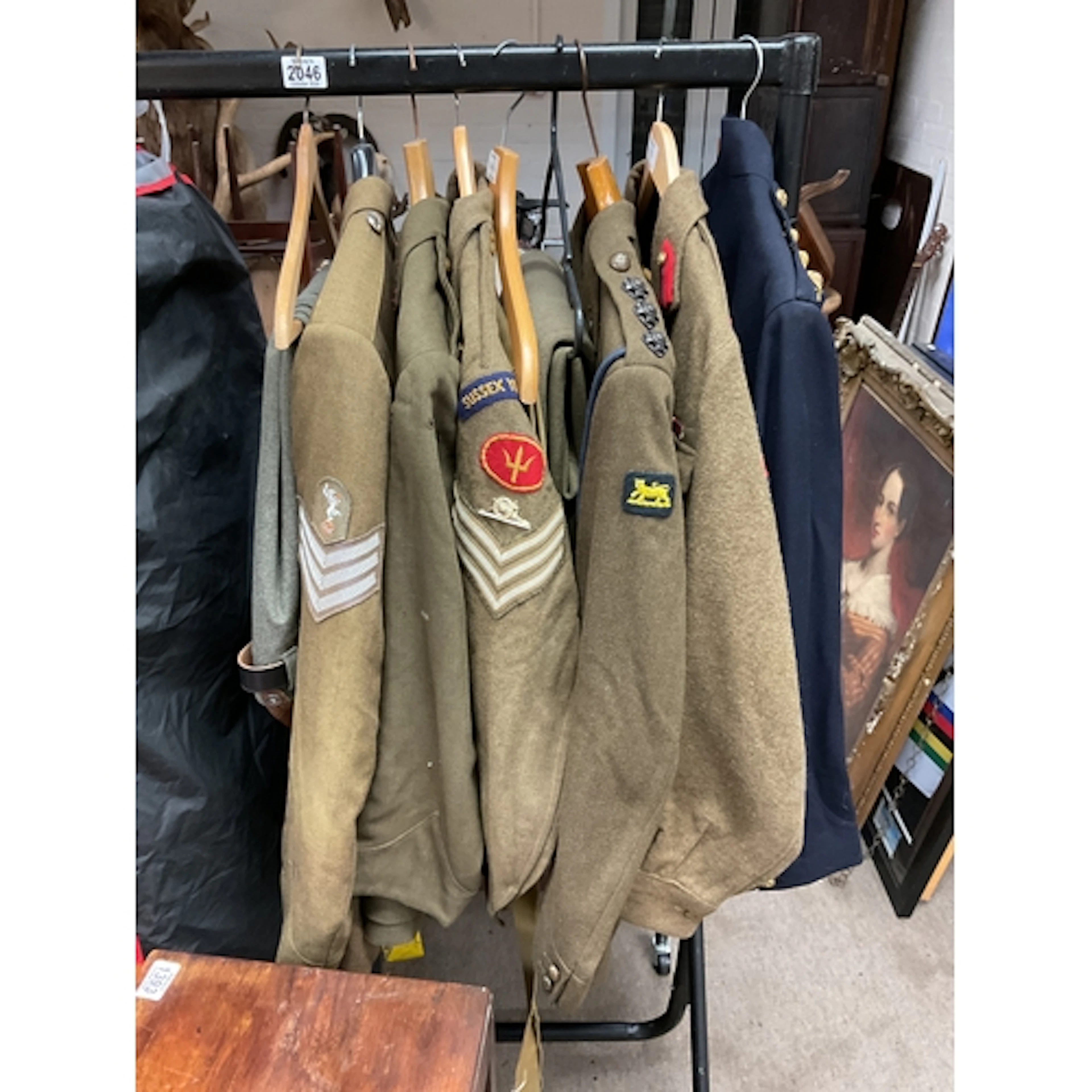 Nine WWII and post war tunics and trousers, to inc some high...