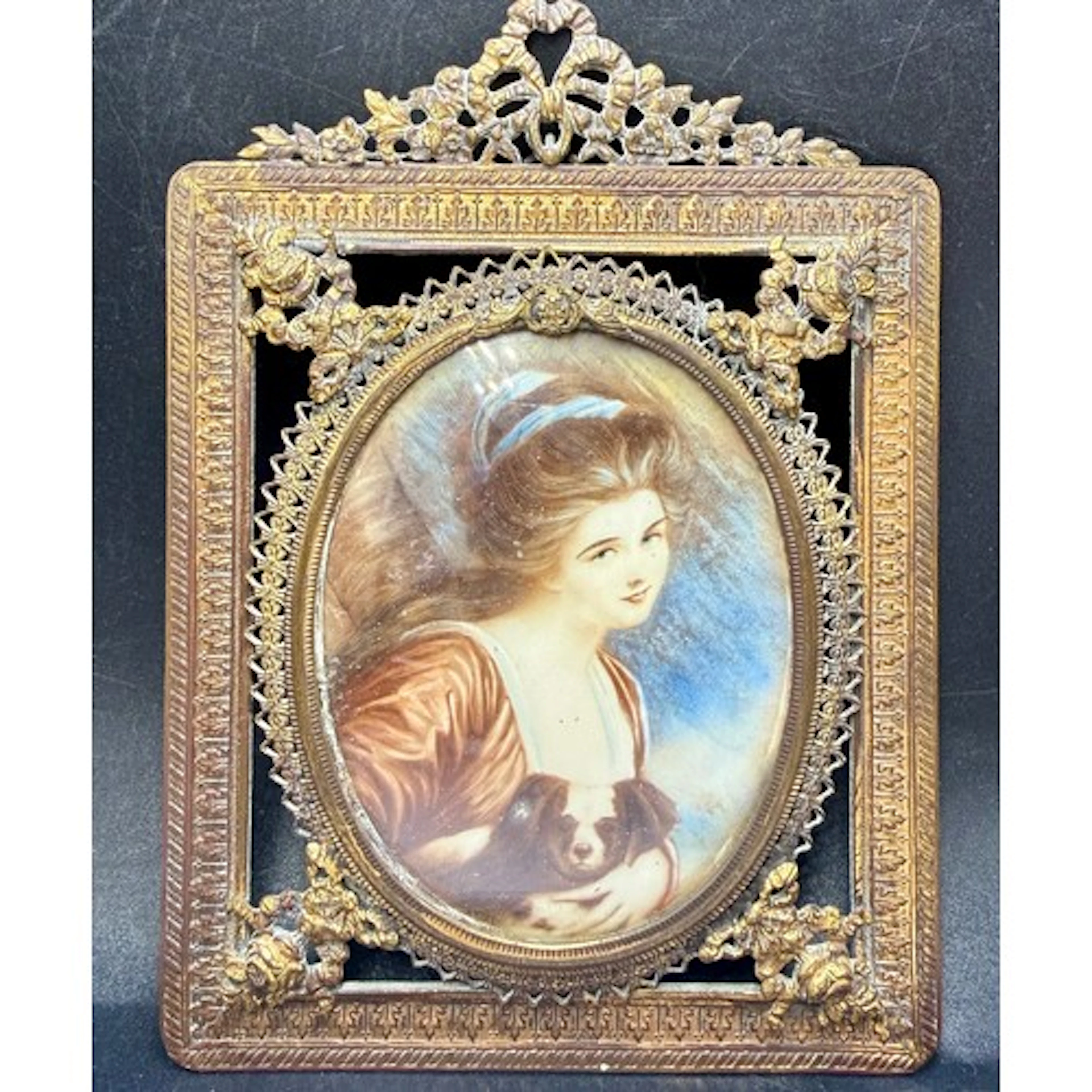 A square ormolu framed miniature on ivory of Emma, Lady Hami...
