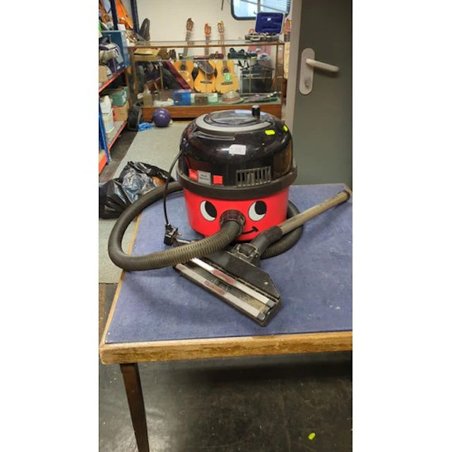 Numatic Henry cylinder vacuum cleaner with red body, black m...