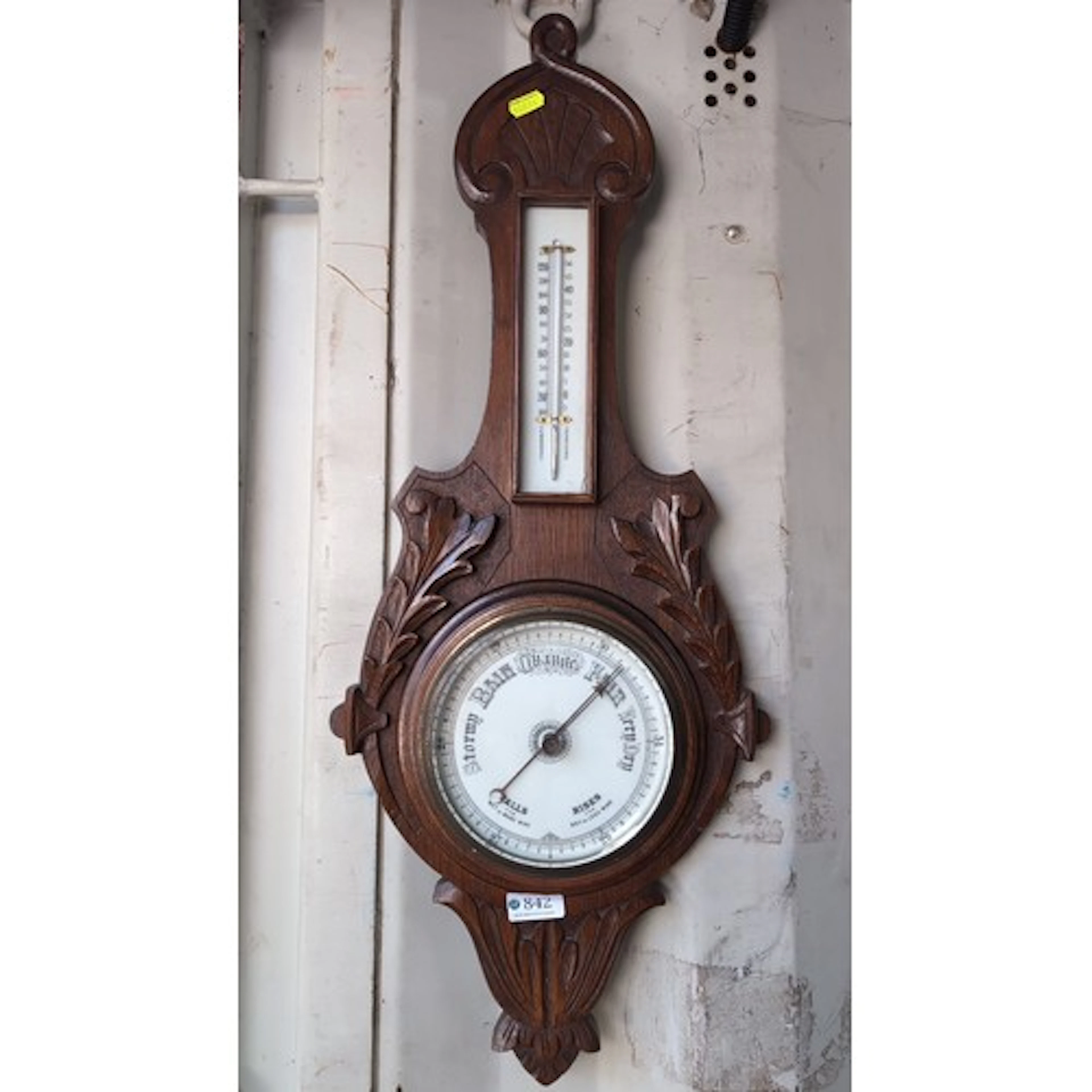 Early 20th century carved oak wall barometer and thermometer...