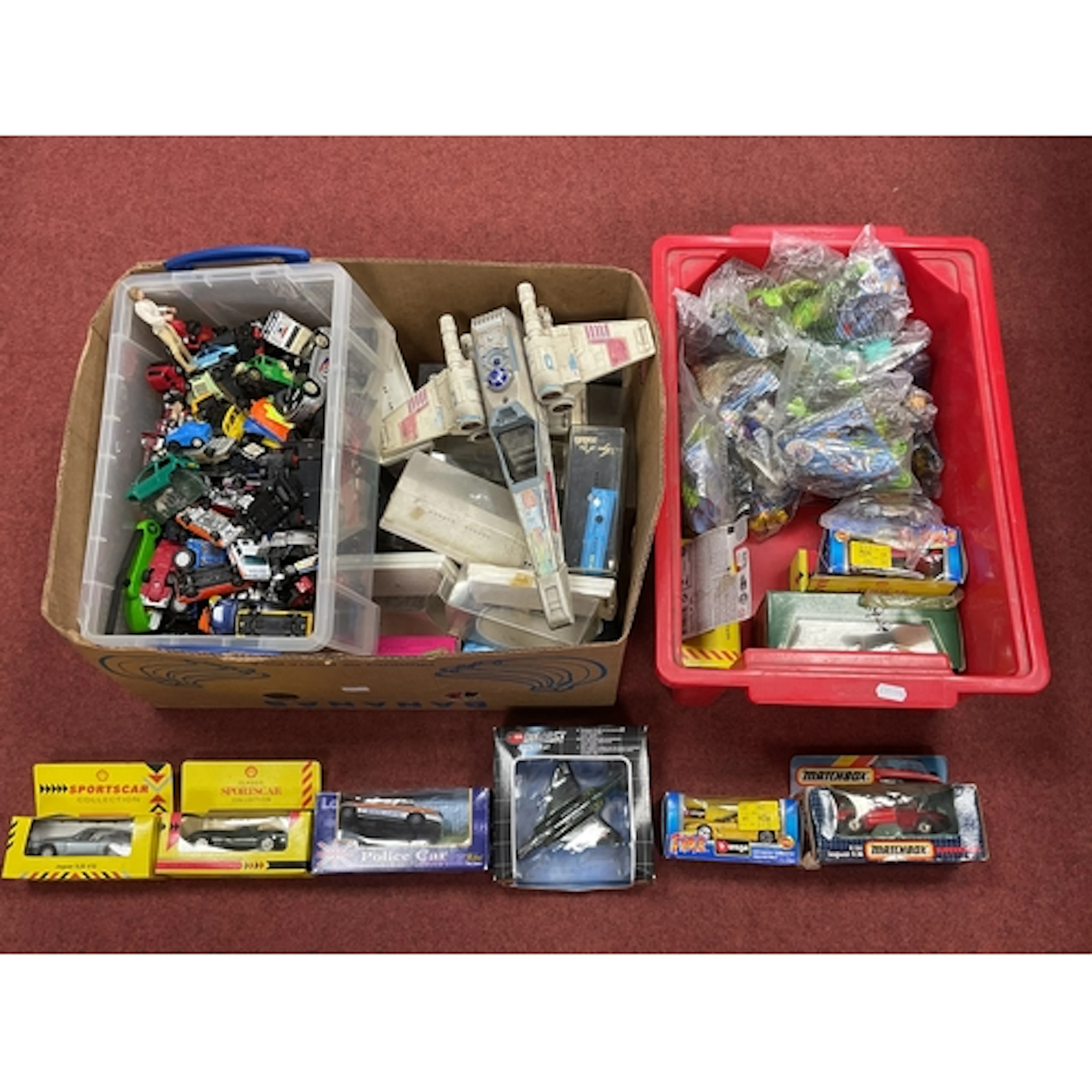 A quantity of diecast model vehicles both boxed and loose by...