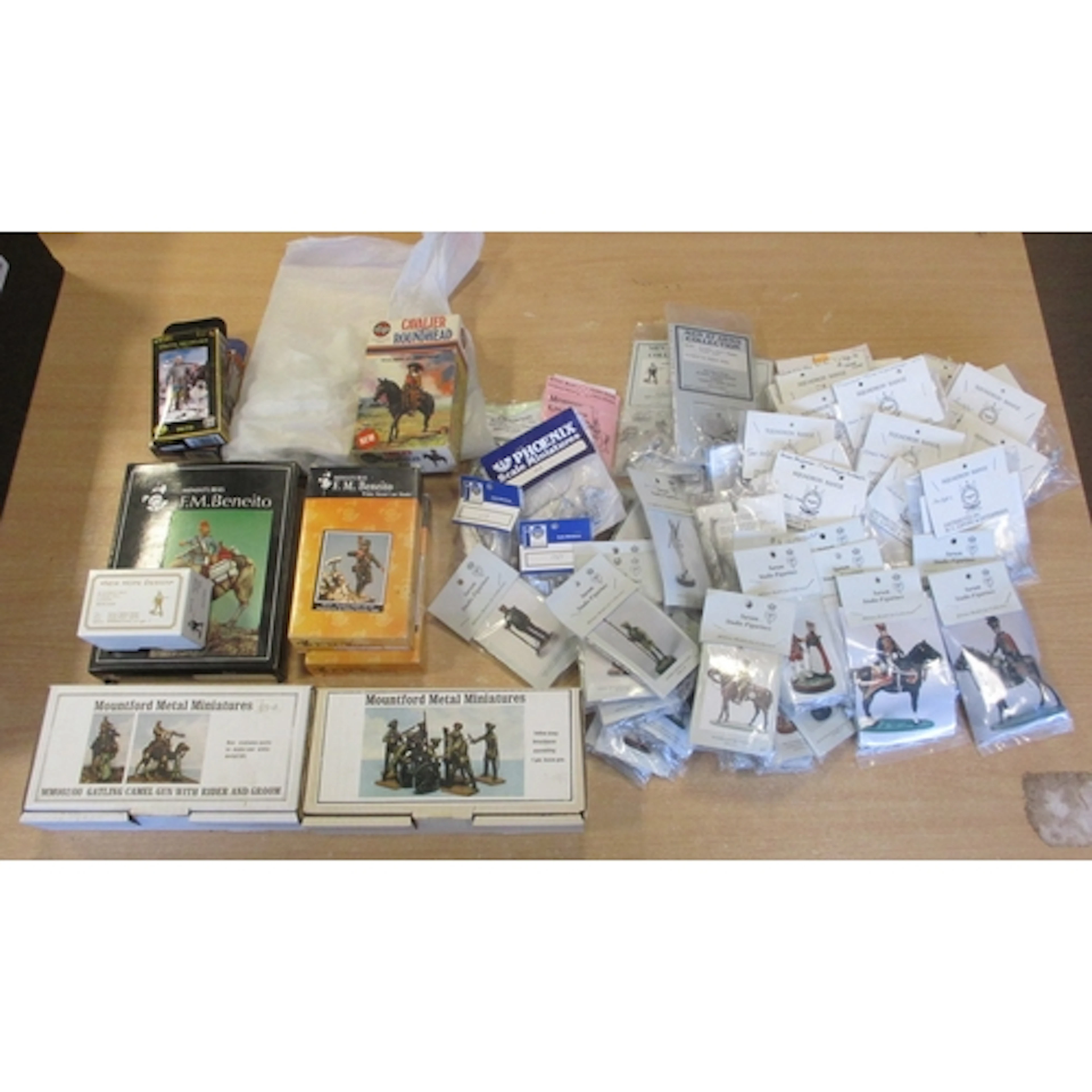 Collection of unpainted and unassembled metal soldiers, gene...