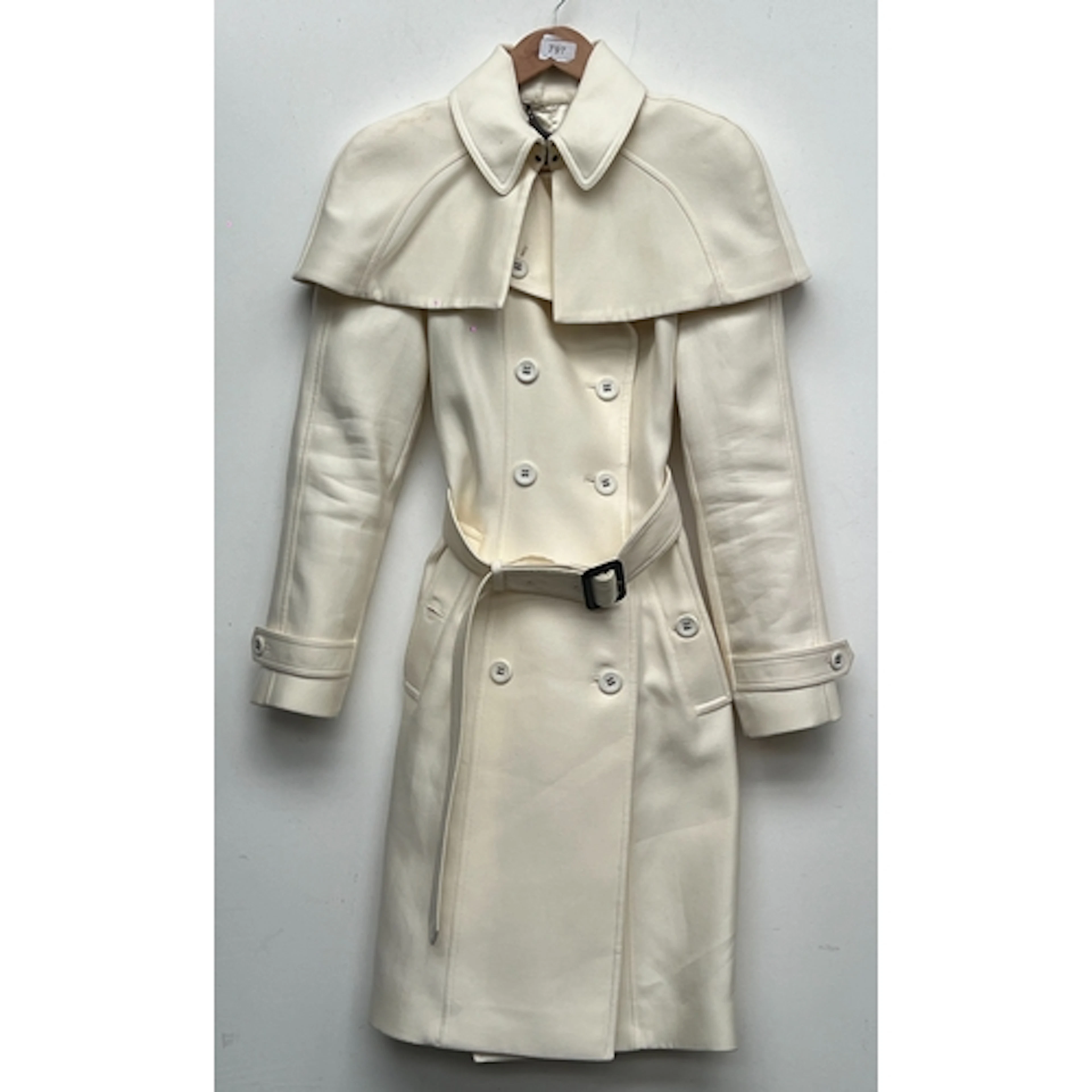 A Burberry Prorsum cream trench coat, size 40