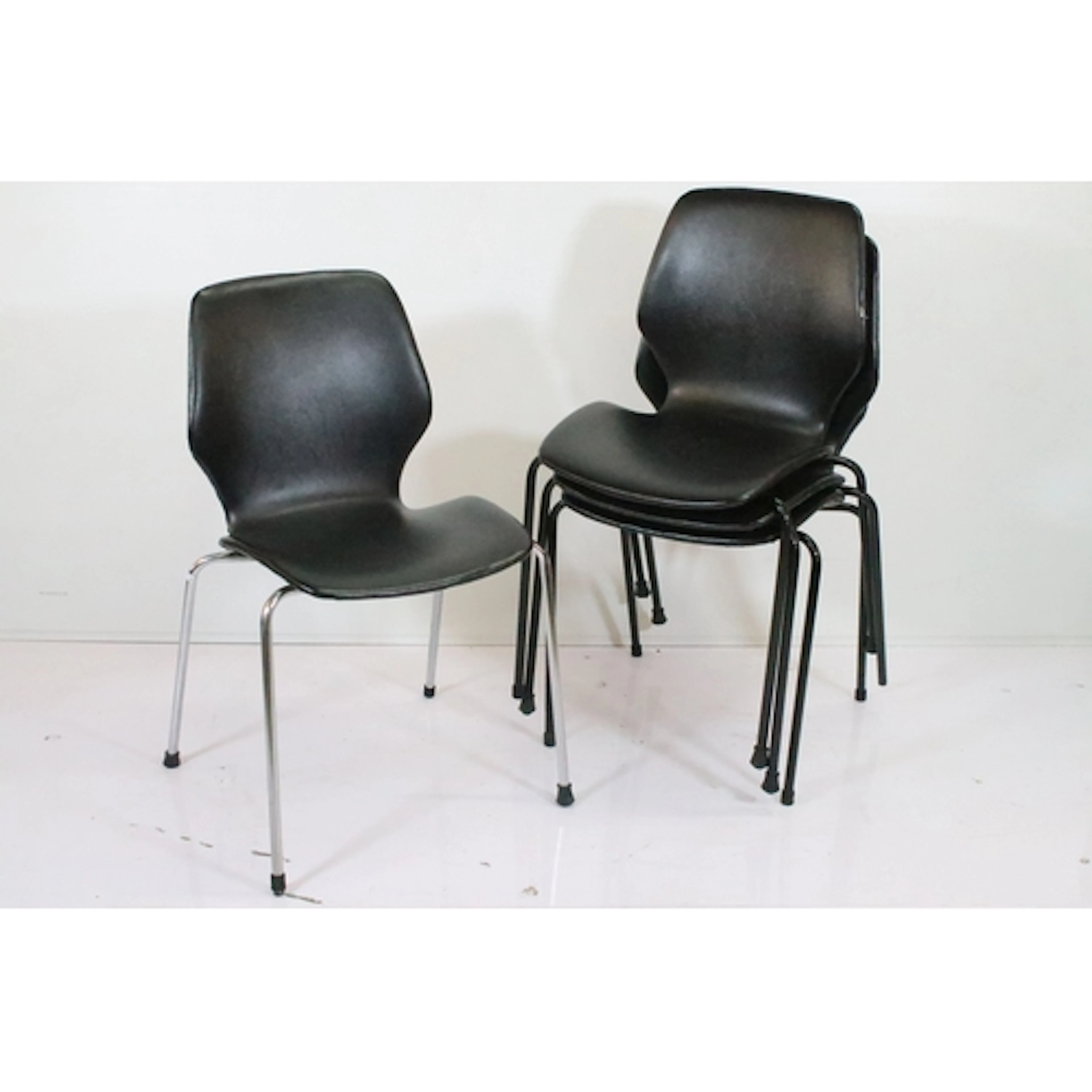 Harlequin set of five contemporary black leatherette and tub...
