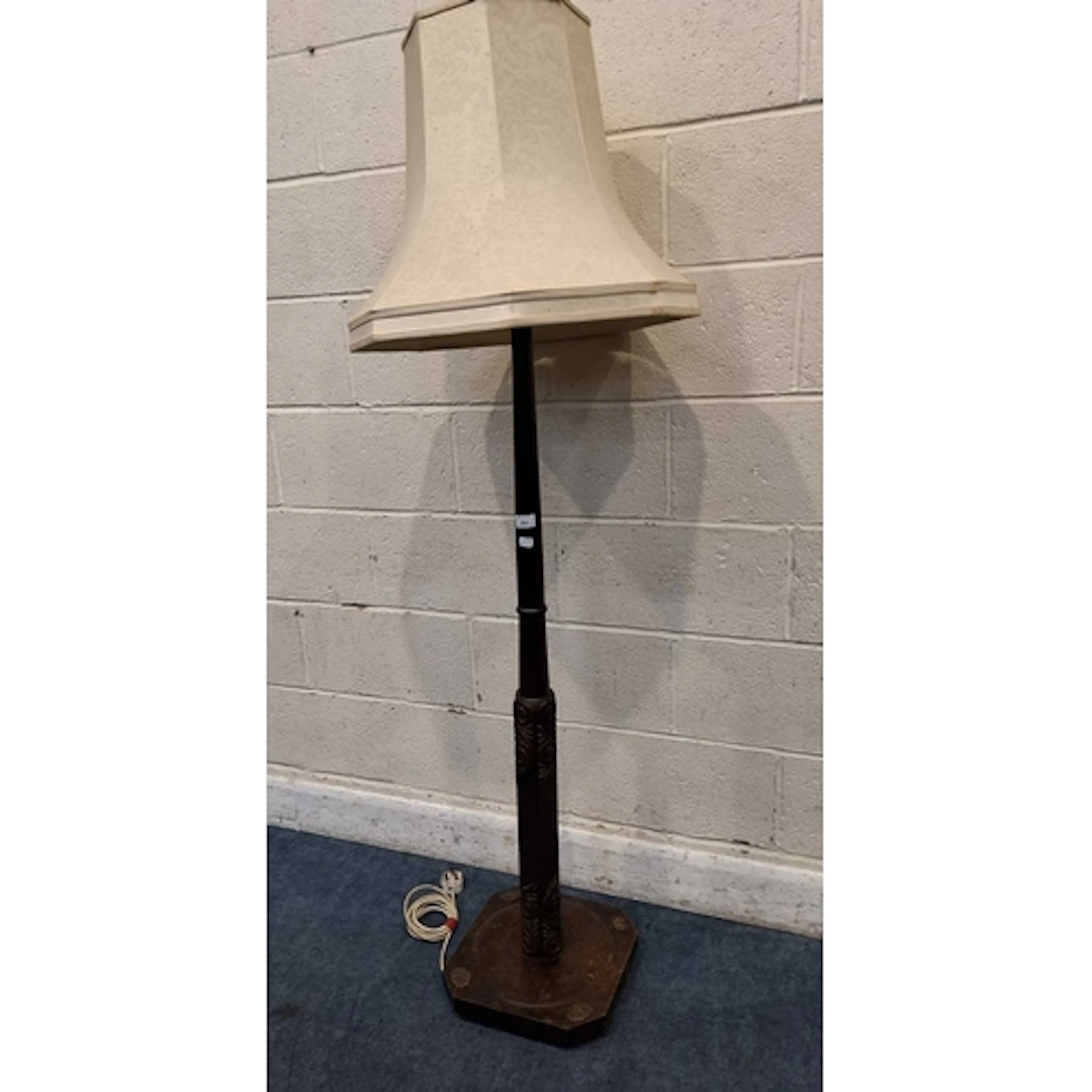 AN ORIENTAL HARDWOOD STANDARD LAMP, with carved details (he...