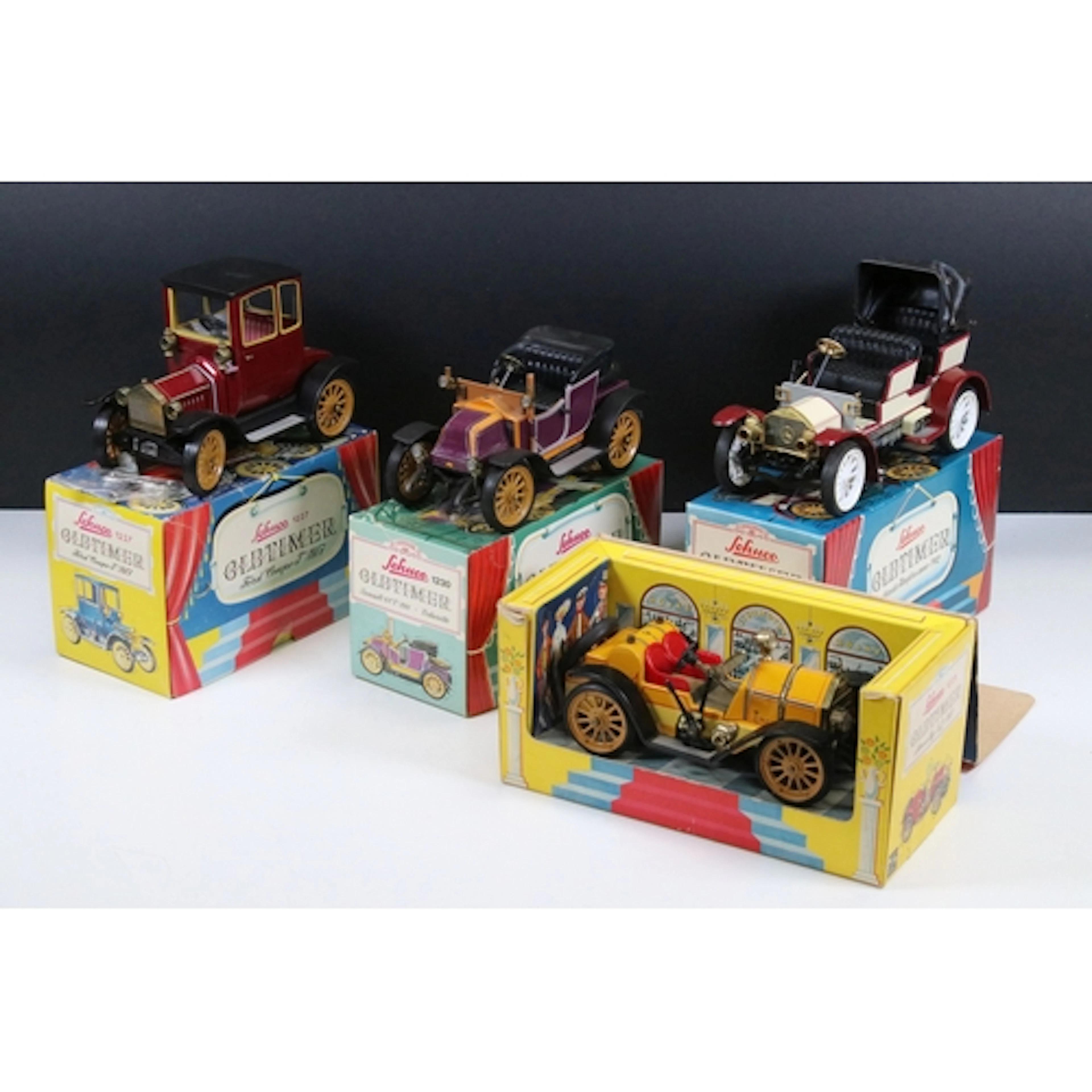 Four boxed Schuco Old Timer tinplate models to include 1227 ...