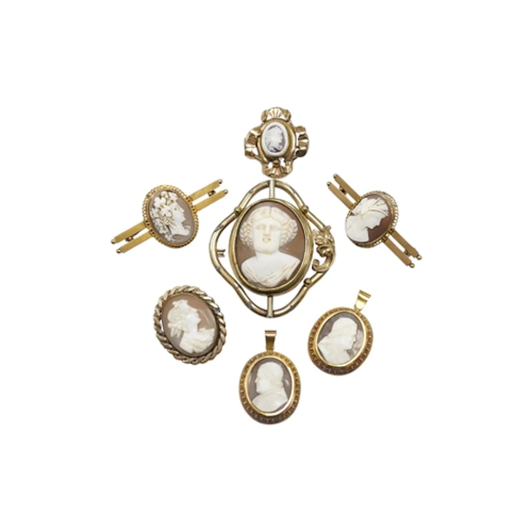 A 9ct gold mounted cameo shell bar brooch, 42mm, one other s...