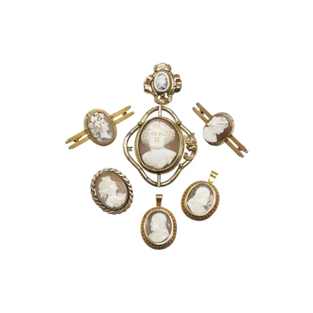 A 9ct gold mounted cameo shell bar brooch, 42mm, one other s...