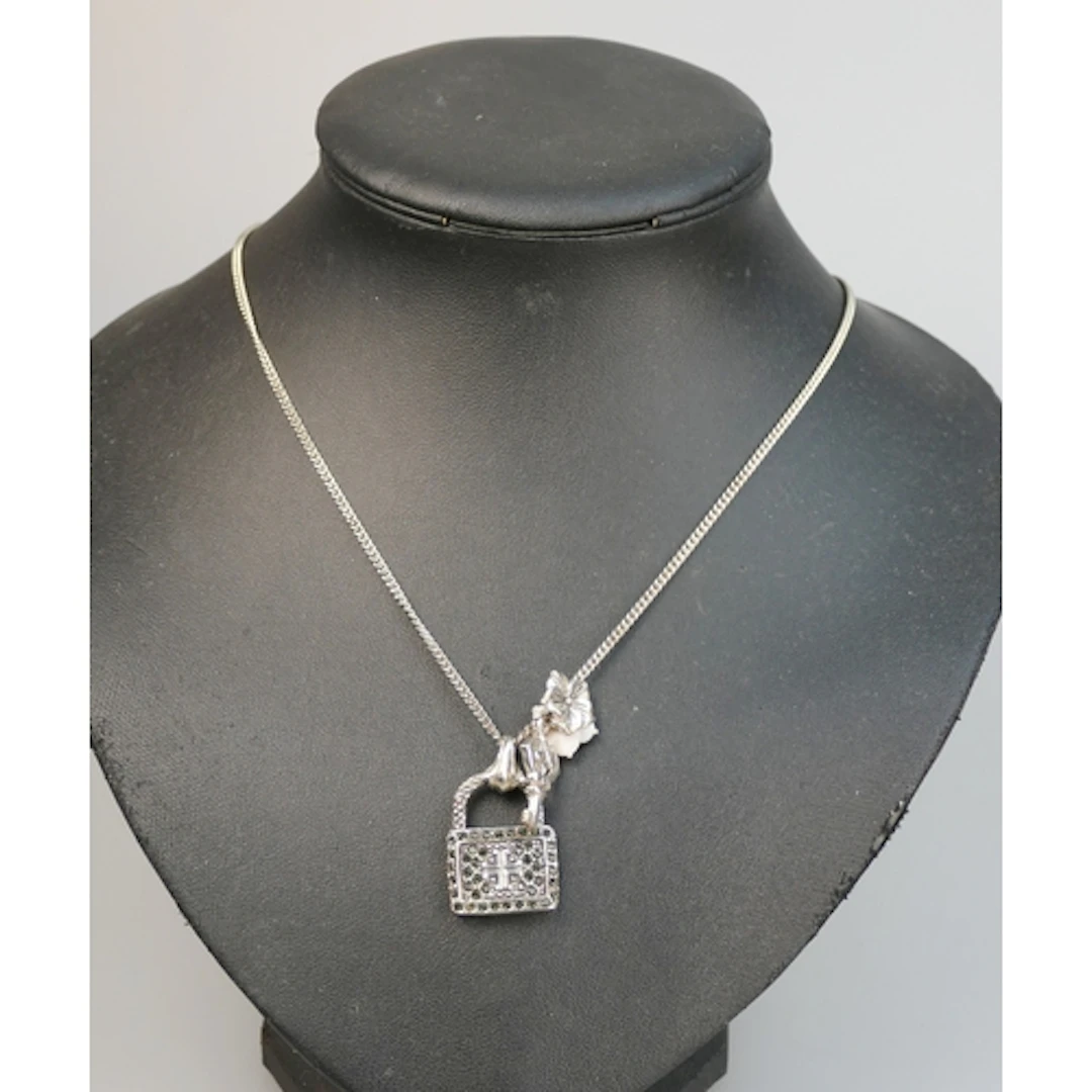 An Azuni silver necklace with diamante padlock pendant, 18.9...