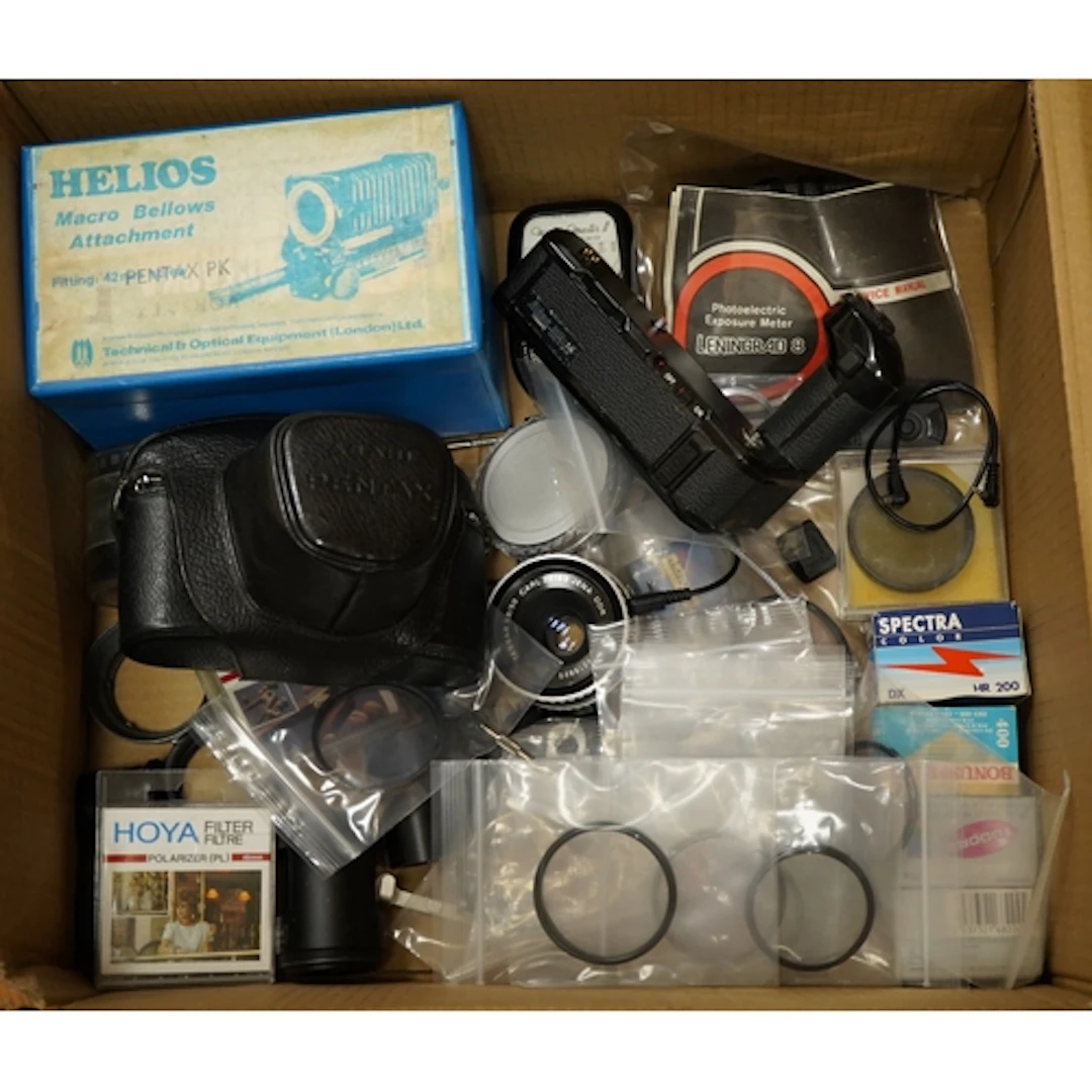 An Asahi Pentax S1a 35mm SLR camera with lens and leather ca...