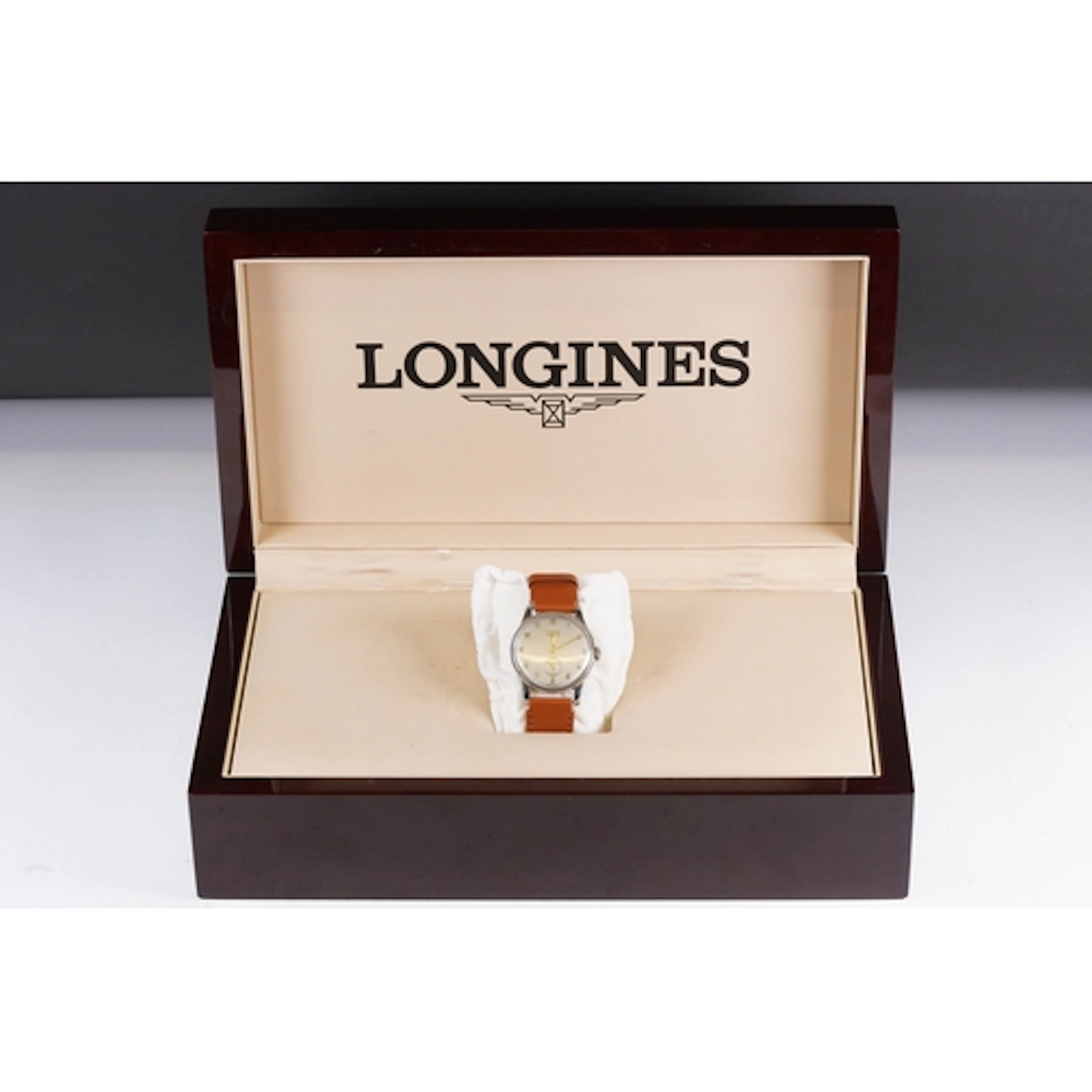 Mid 20th Century Longines having a round silvered dial with ...