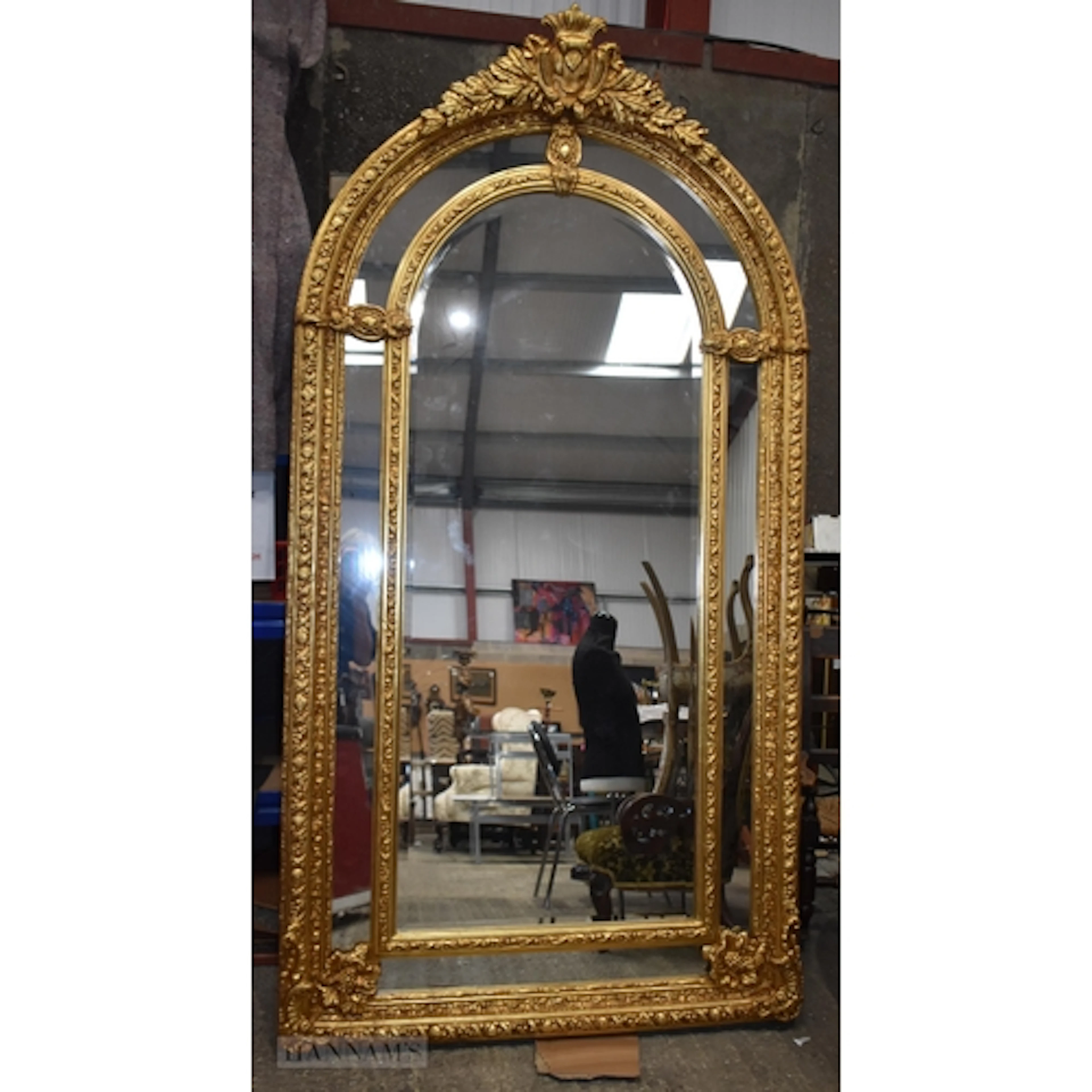 A large giltwood framed baroque style mirror 220 x 110cm