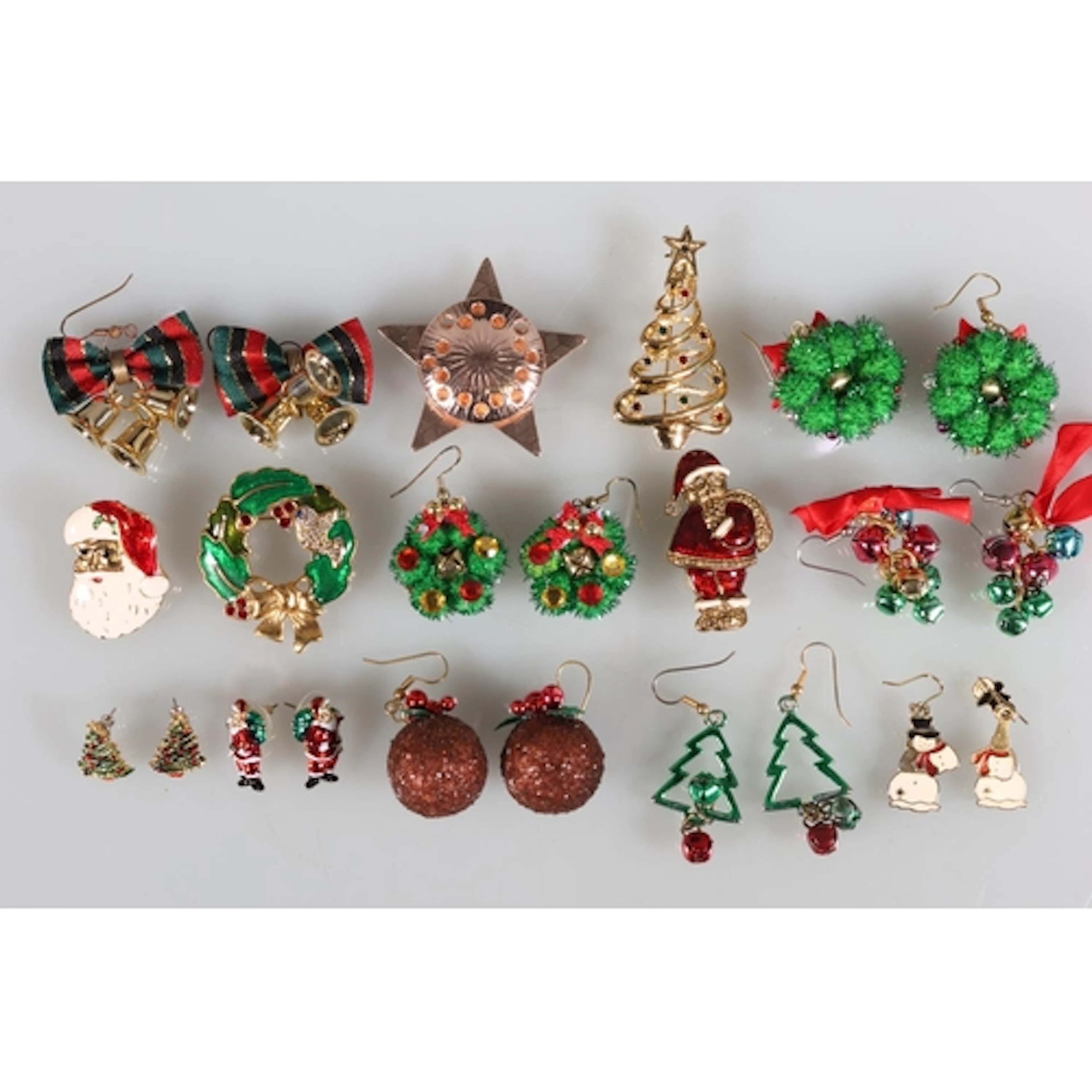 Christmas themed jewellery to include a wreath brooch by Mon...