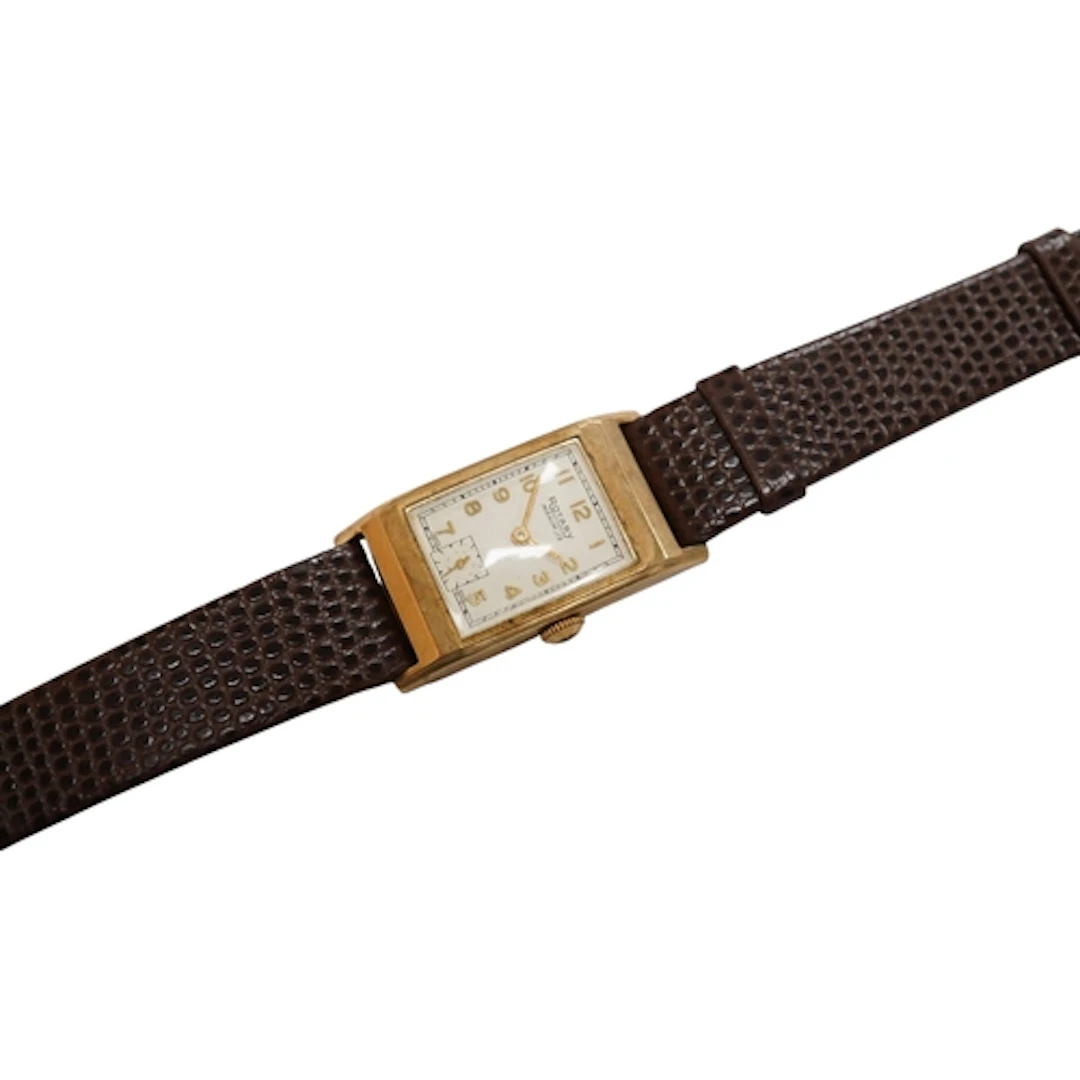 A 9ct Rotary Maximus tank manual wind wrist watch, with Arab...
