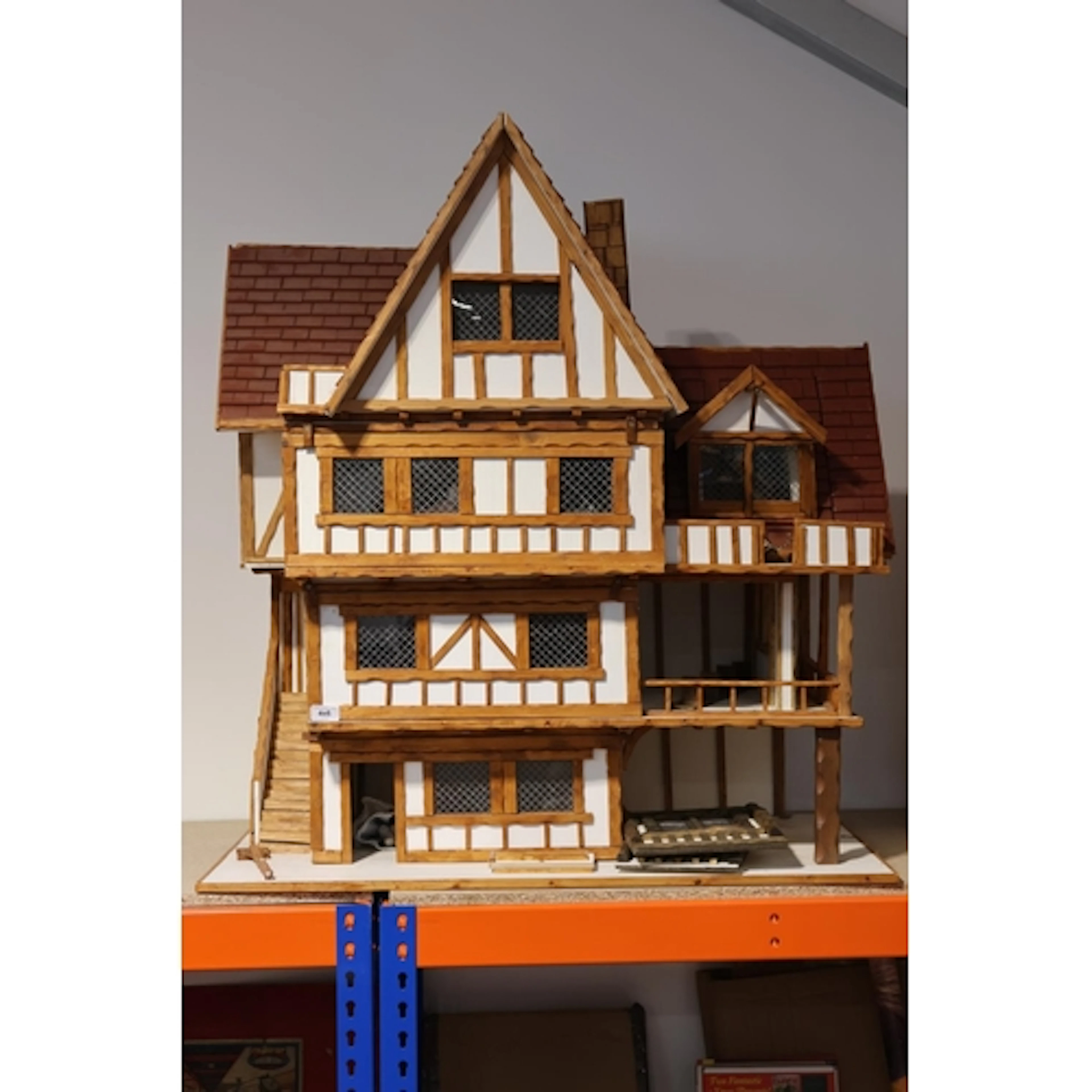Vintage dolls house with accessories, 101cm tall.