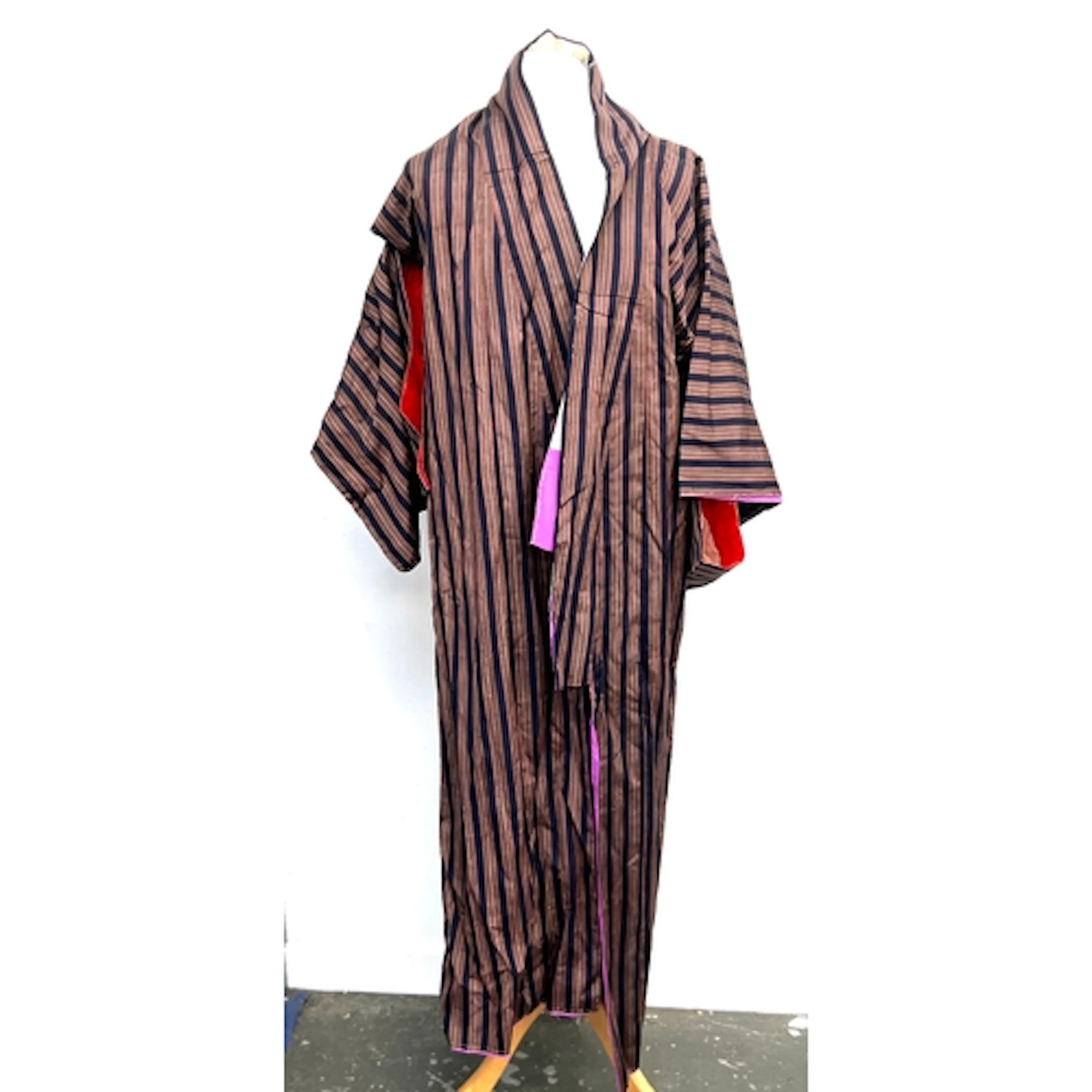A striped silk kimono, with purple and red lining