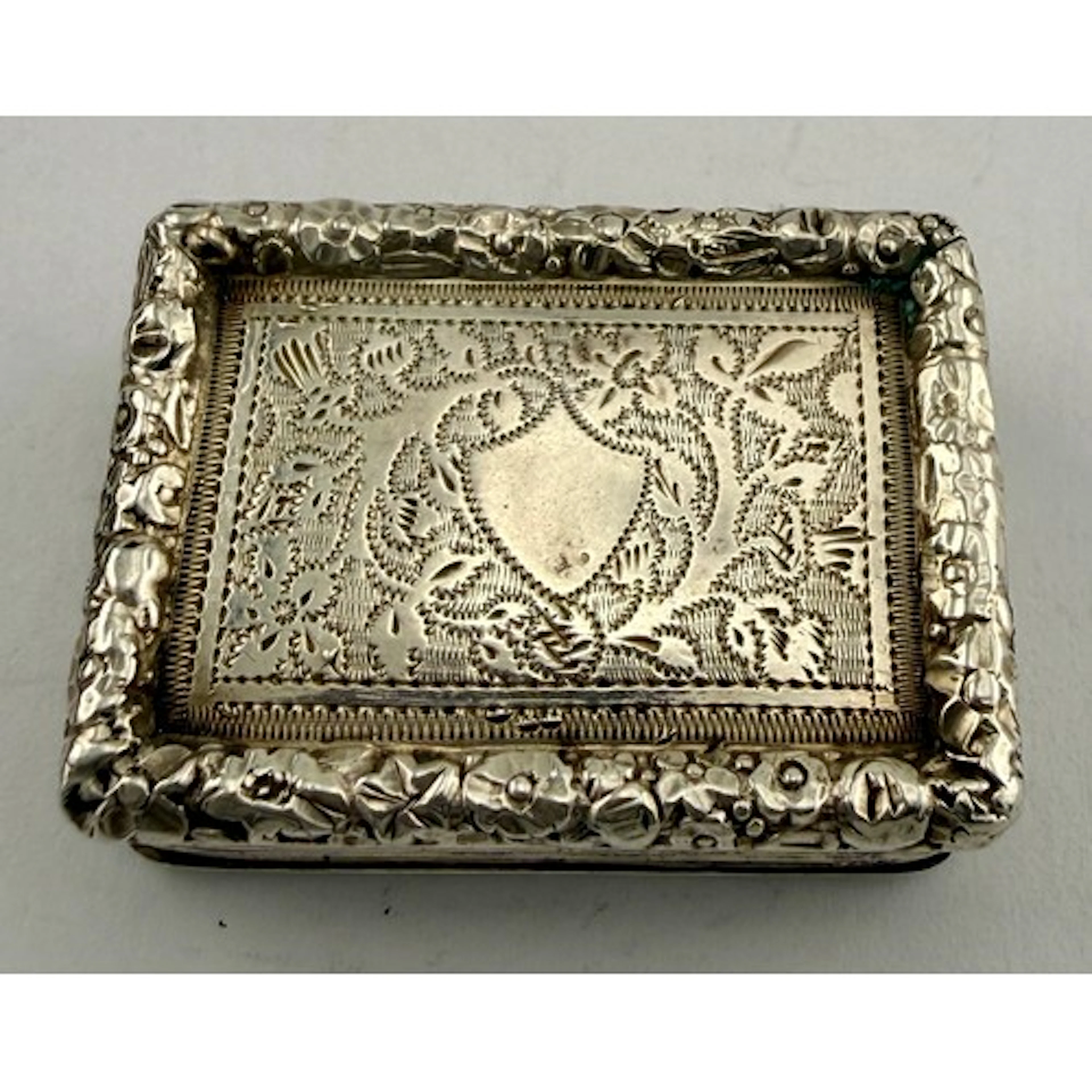 Silver vinaigrette with pierced gilt grill. Birmingham 1835,...
