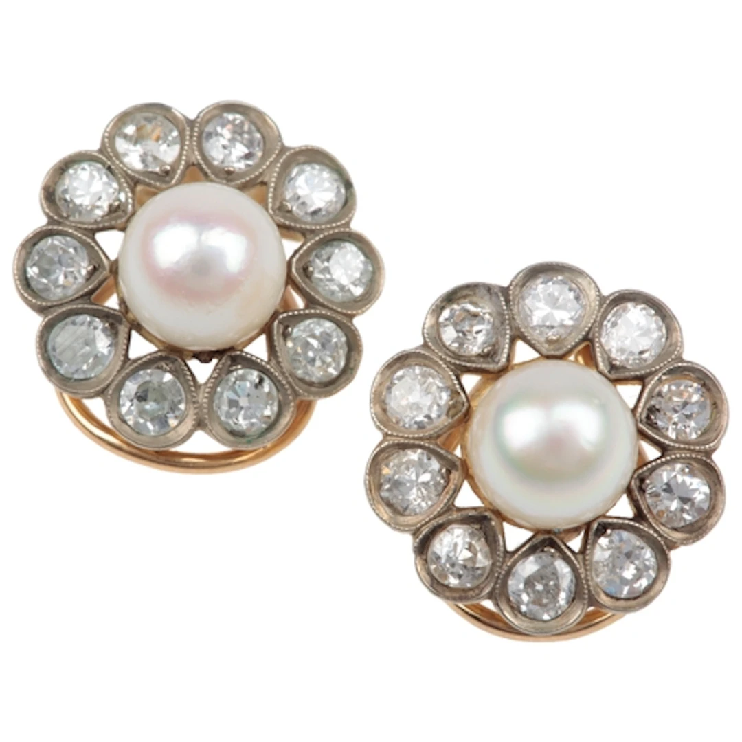 A pair of cultured pearl and diamond cluster earrings, each ...
