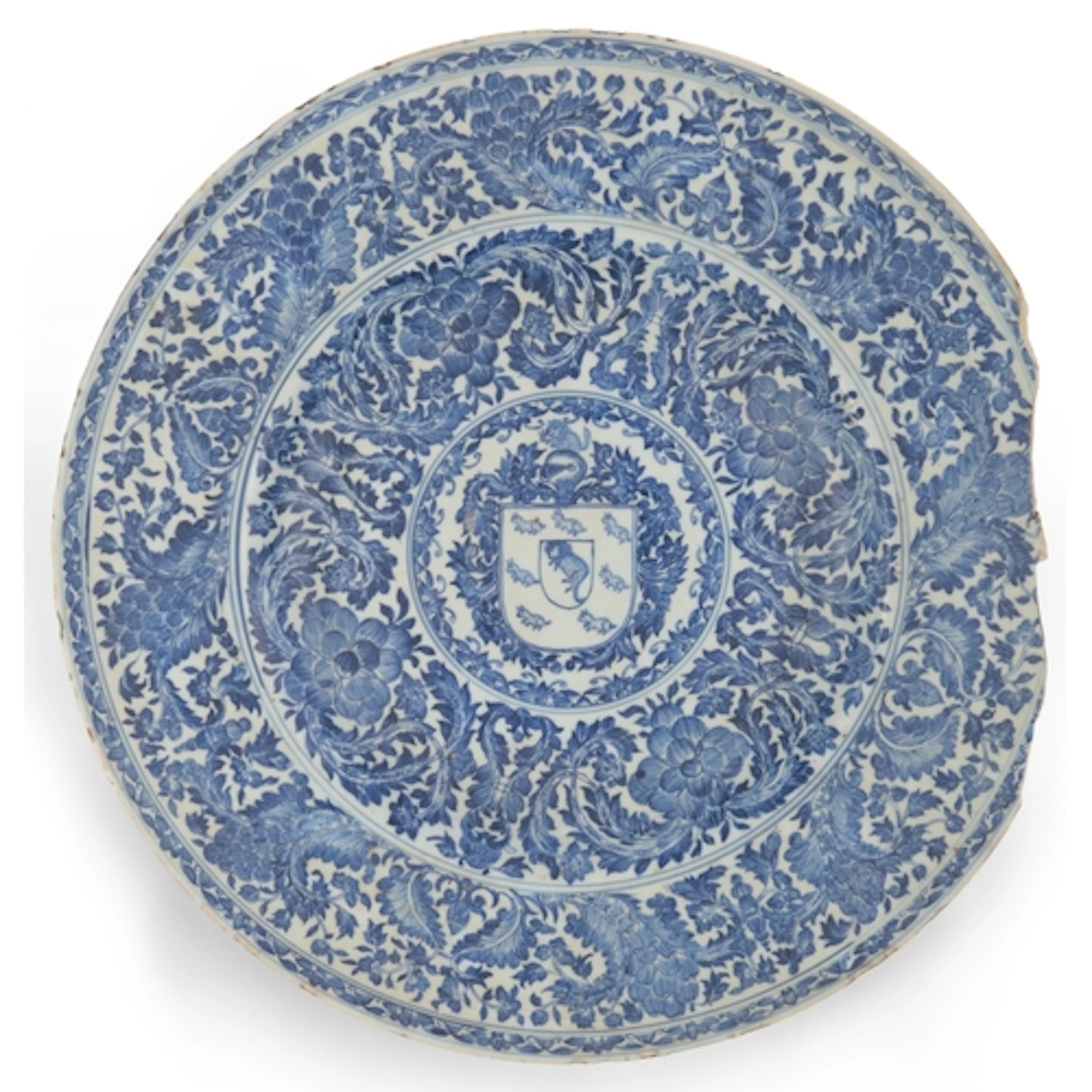 A rare Chinese blue and white armorial charger with the arms...
