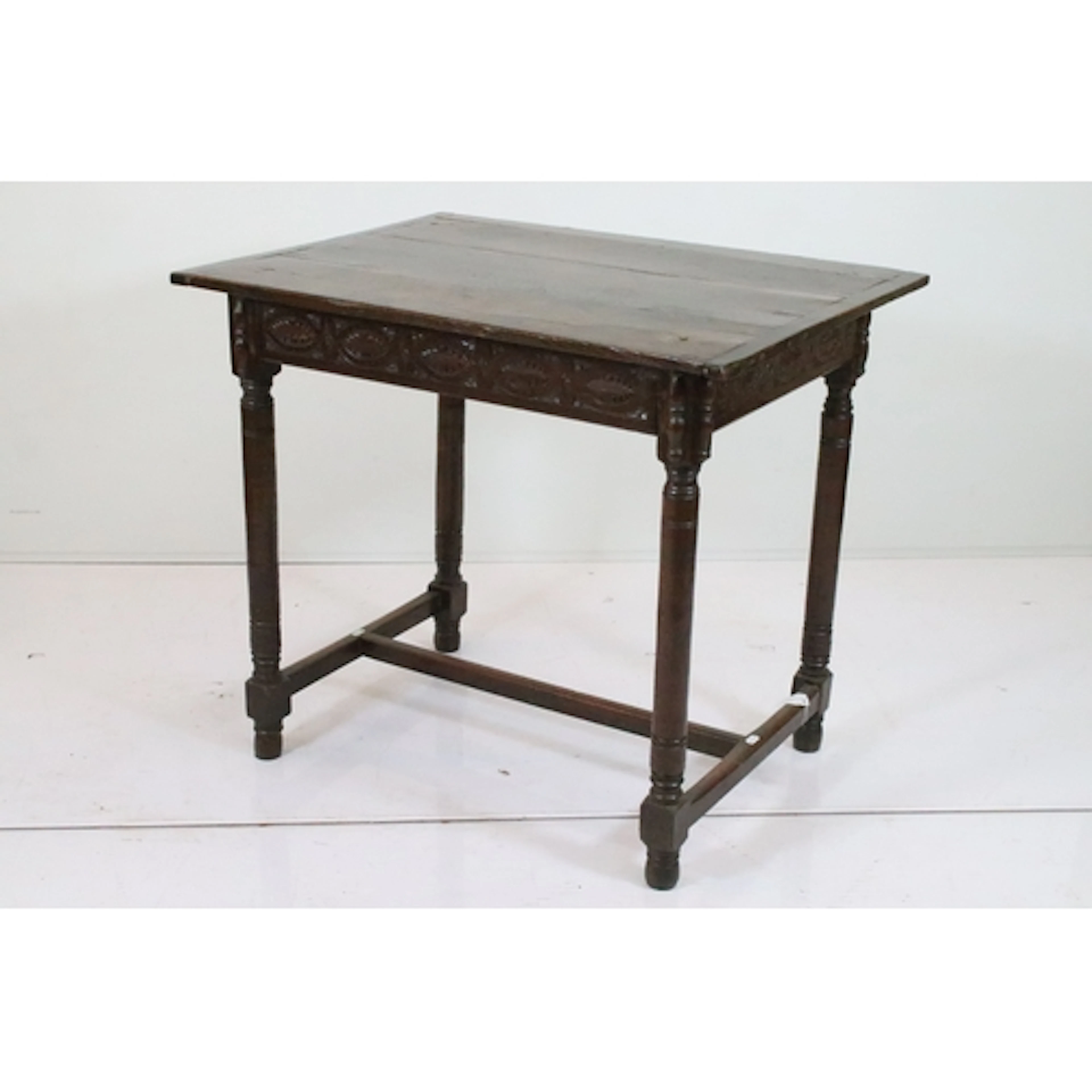 Victorian and earlier oak side table, the plank top with cle...