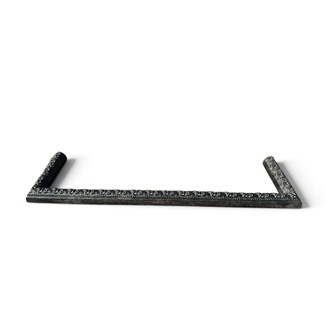 A VICTORIAN CAST IRON FIRE CURB, DECORATED WITH REPEATED FOL...