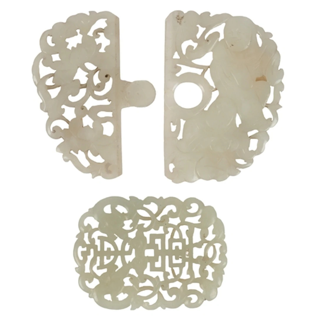 A Chinese 'Hehe Erxian' white jade two-piece belt buckle and...