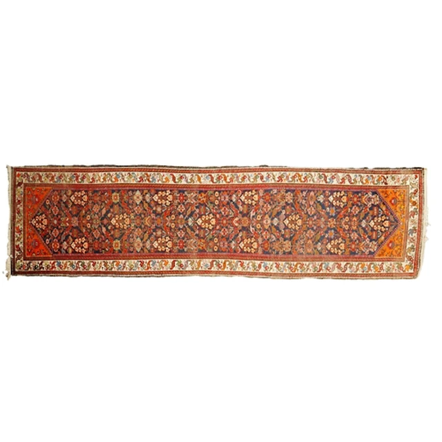 A Malayer blue ground runner, early 20th century, with dense...