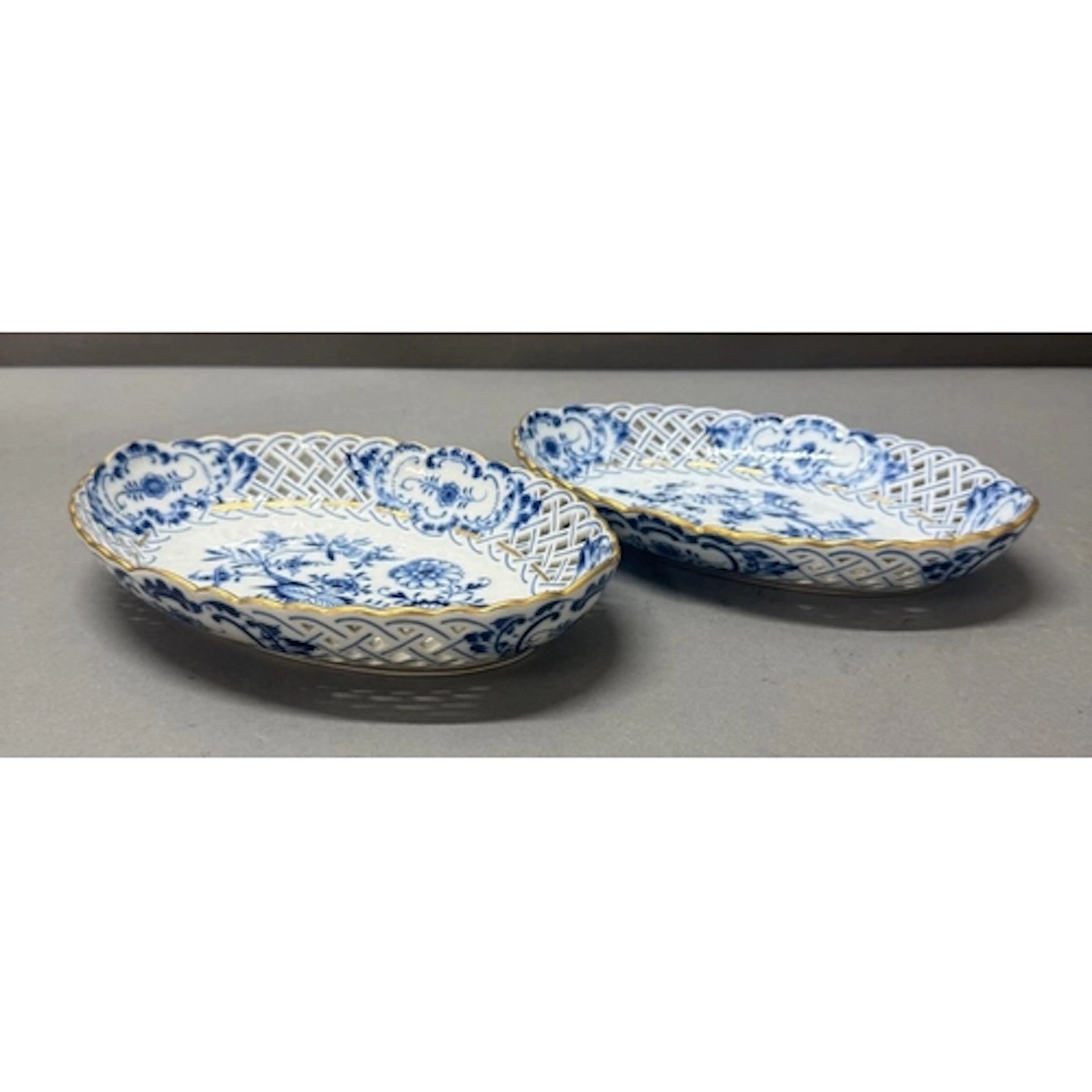 A pair of Meissen "Blue Onion" pattern peirced oval dishes w...