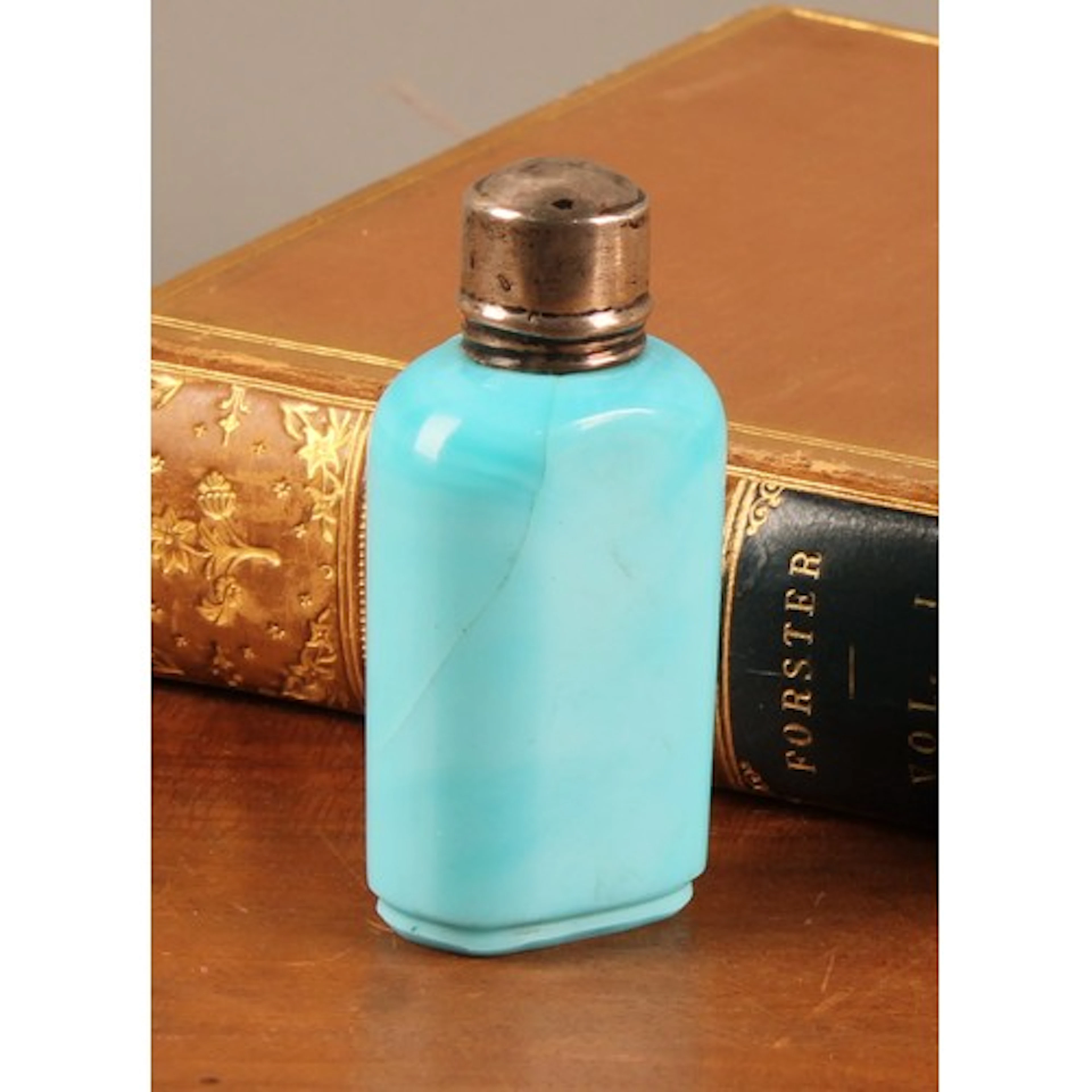 A 19th century turquoise opaque glass scent bottle, screw fi...