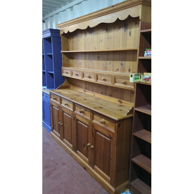 Pine kitchen dresser with moulded cornice and shaped apron a...