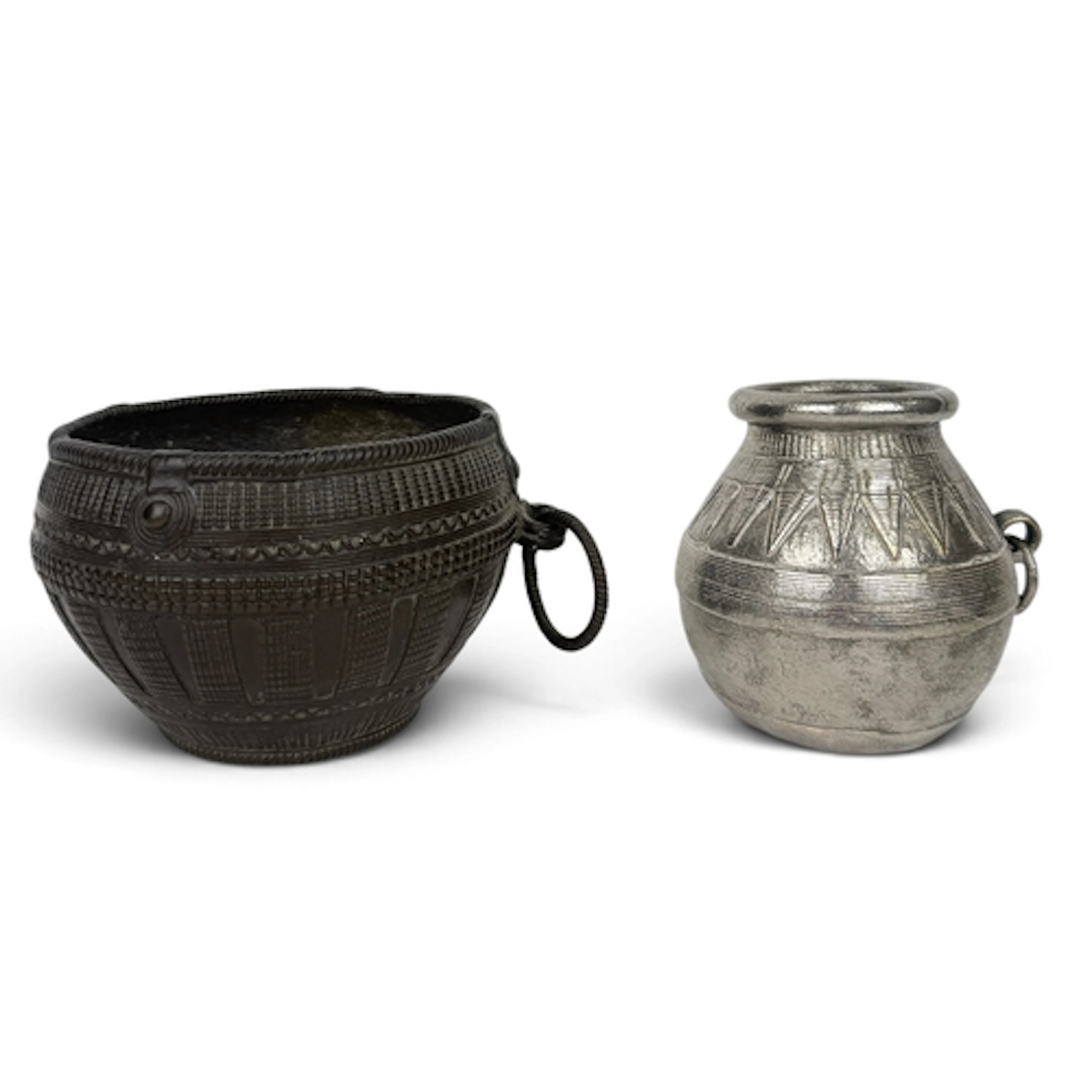 A SILVERED BRASS TRIBAL POT TOGETHER WITH ANOTHER, POSSIBLY ...
