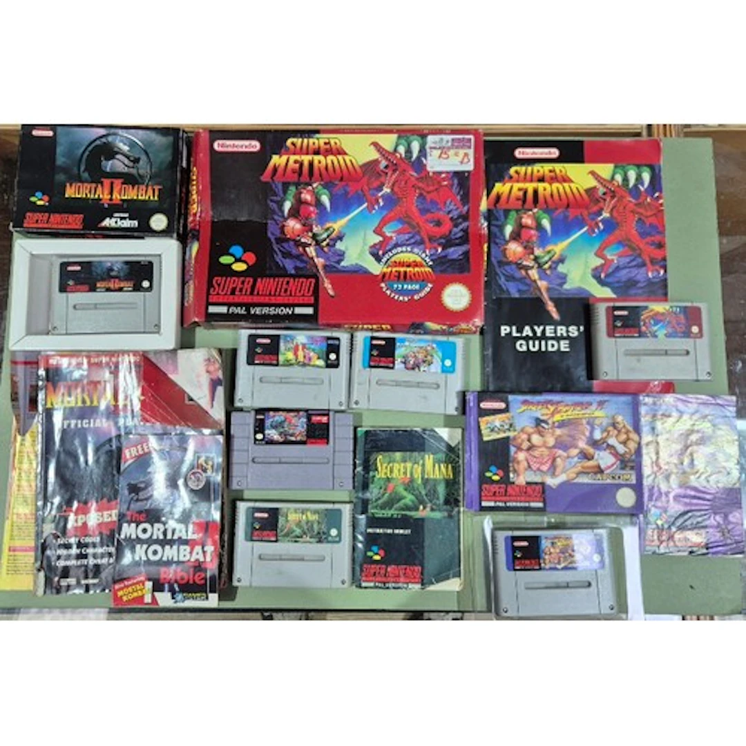 A box of assorted SNES games to include Mortal Kombat II, St...