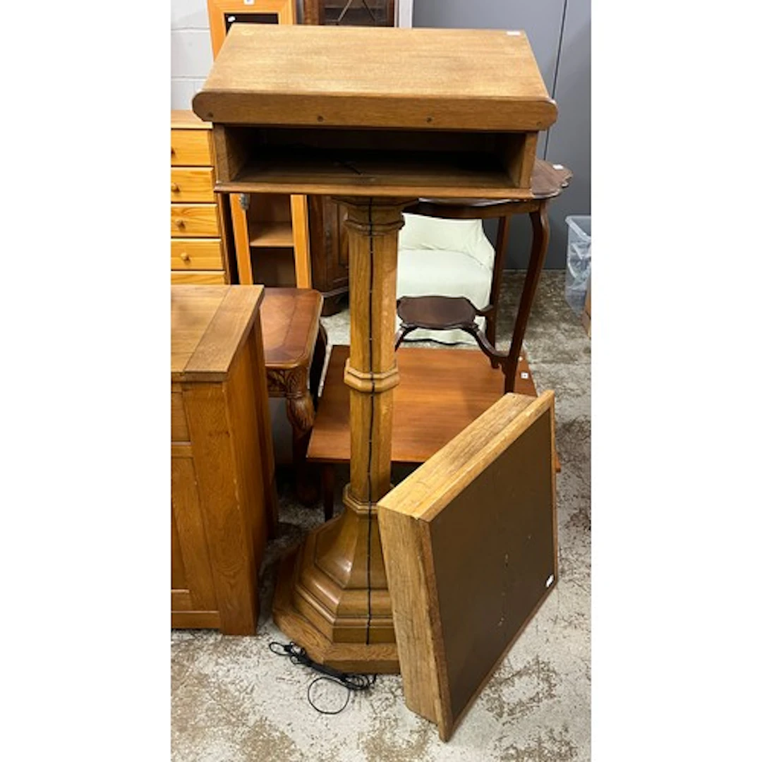 Carved oak church lectern, raised on octagonal column and ba...