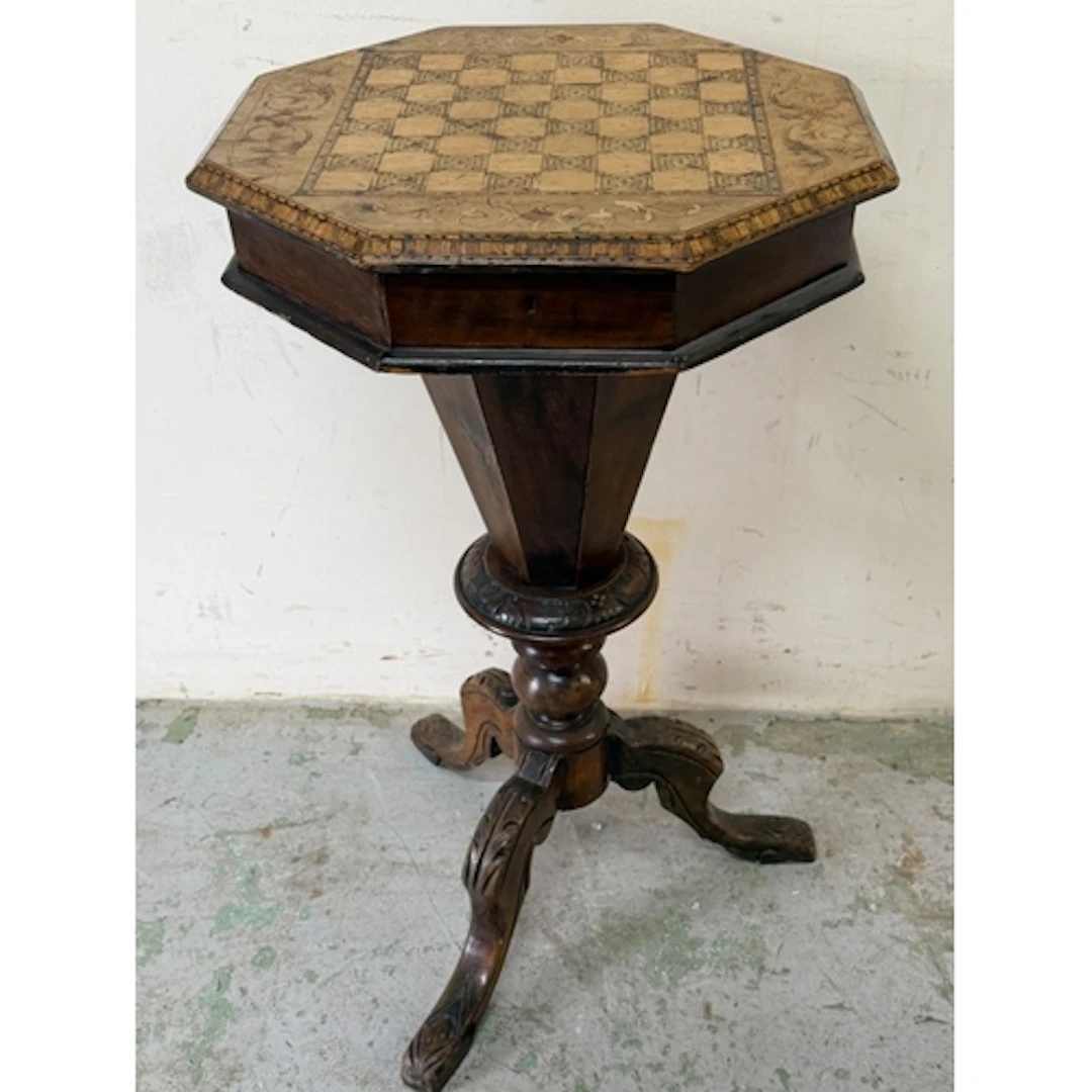 A trumpet games table, octagonal hinged top with inland ches...