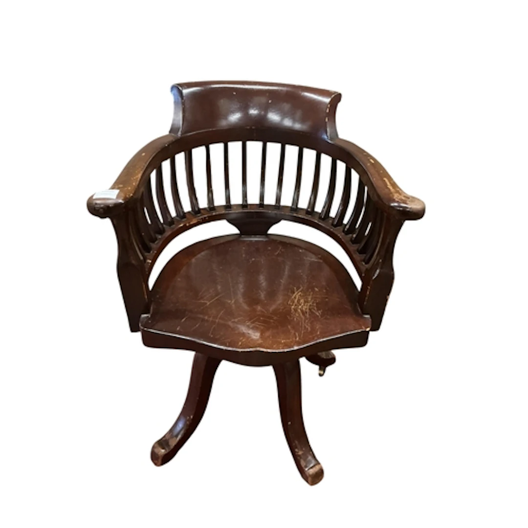 A late Victorian mahogany revolving desk chair, width 64cm, ...