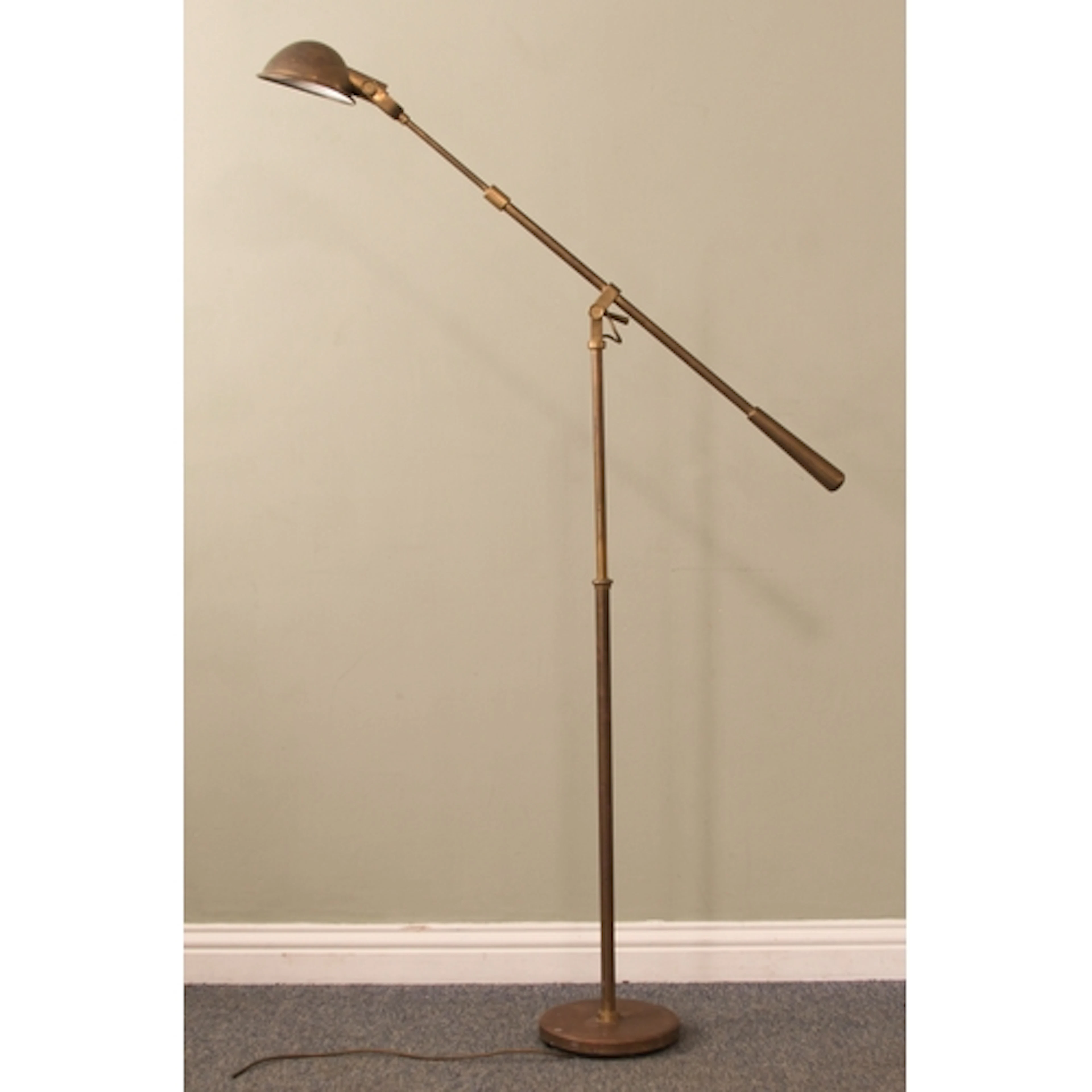 A Ralph Lauren brass reading or floor lamp - with pivotal do...