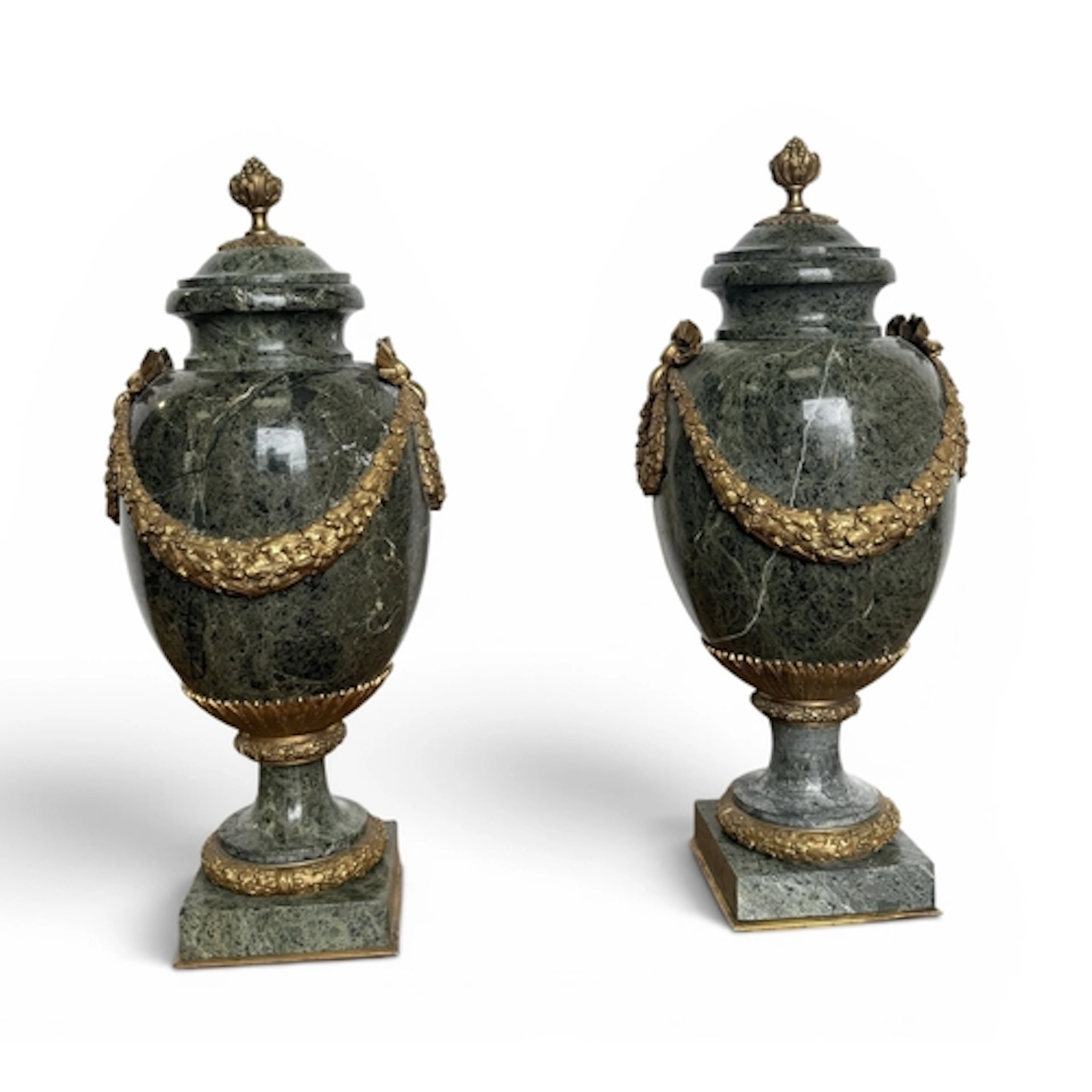 A PAIR OF 19TH CENTURY GREEN MARBLE URNS WITH ORMOLU MOUNTS ...