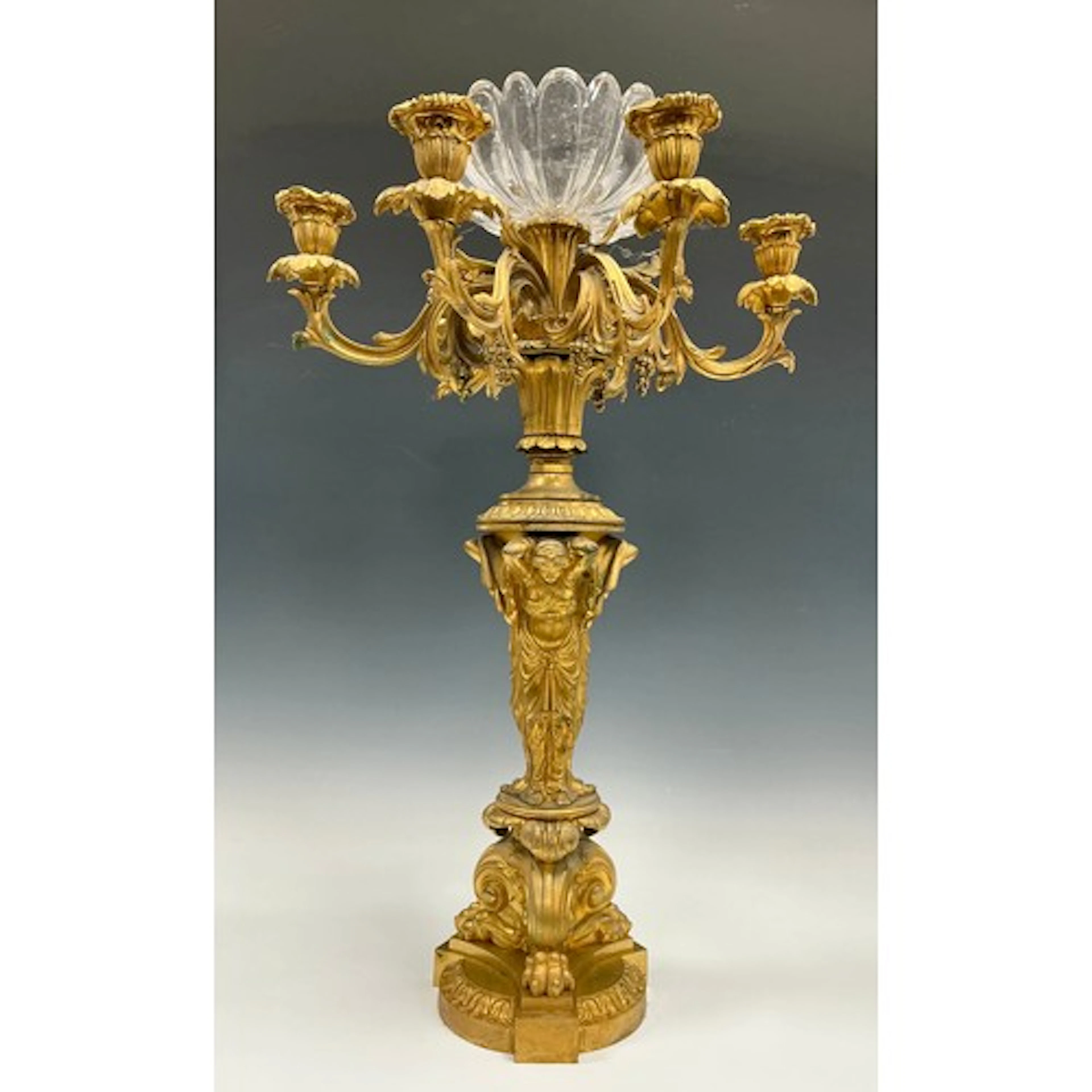 A 19th century ormolu table centre epergne, the clear glass ...