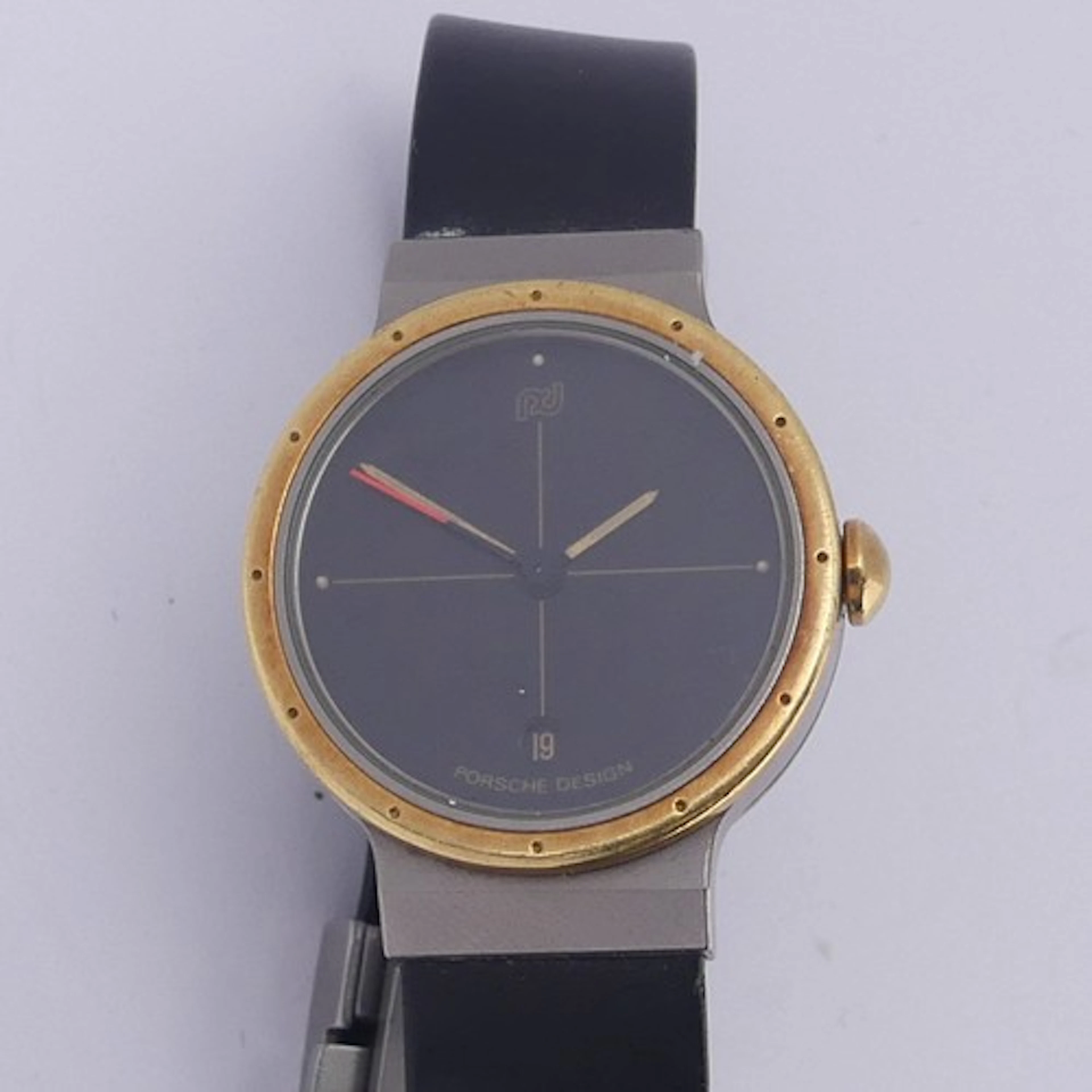 A Porsche Design bi-metal quartz Wristwatch, black dial with...