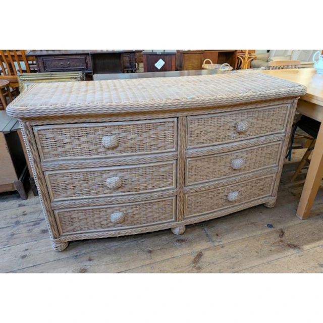A wickerwork bow front chest of six drawers, 55" wide x 31" ...